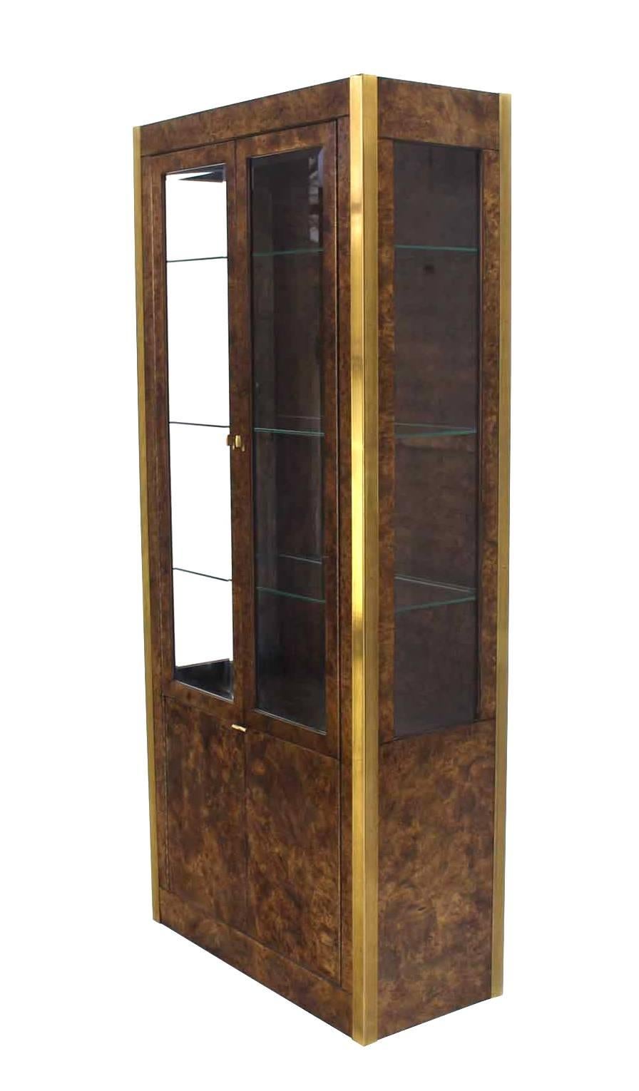 Very nice Mid-Century Modern tall vitrine lighted interior cabinets showcases.