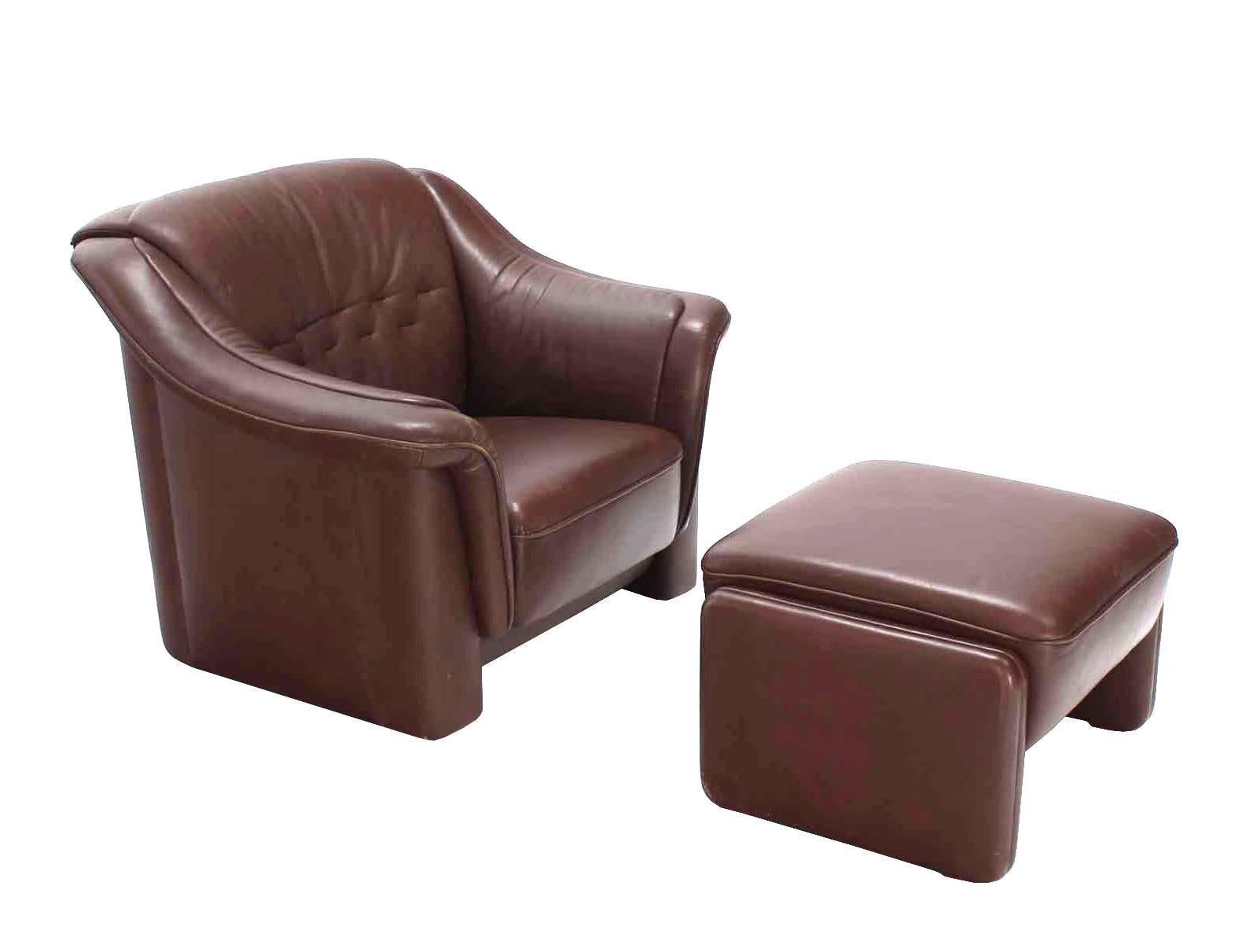 Pair of very nice Mid-Century Modern leather brown lounge chairs with adjustable matching ottomans. 24 x 23 x 16 ottoman.
