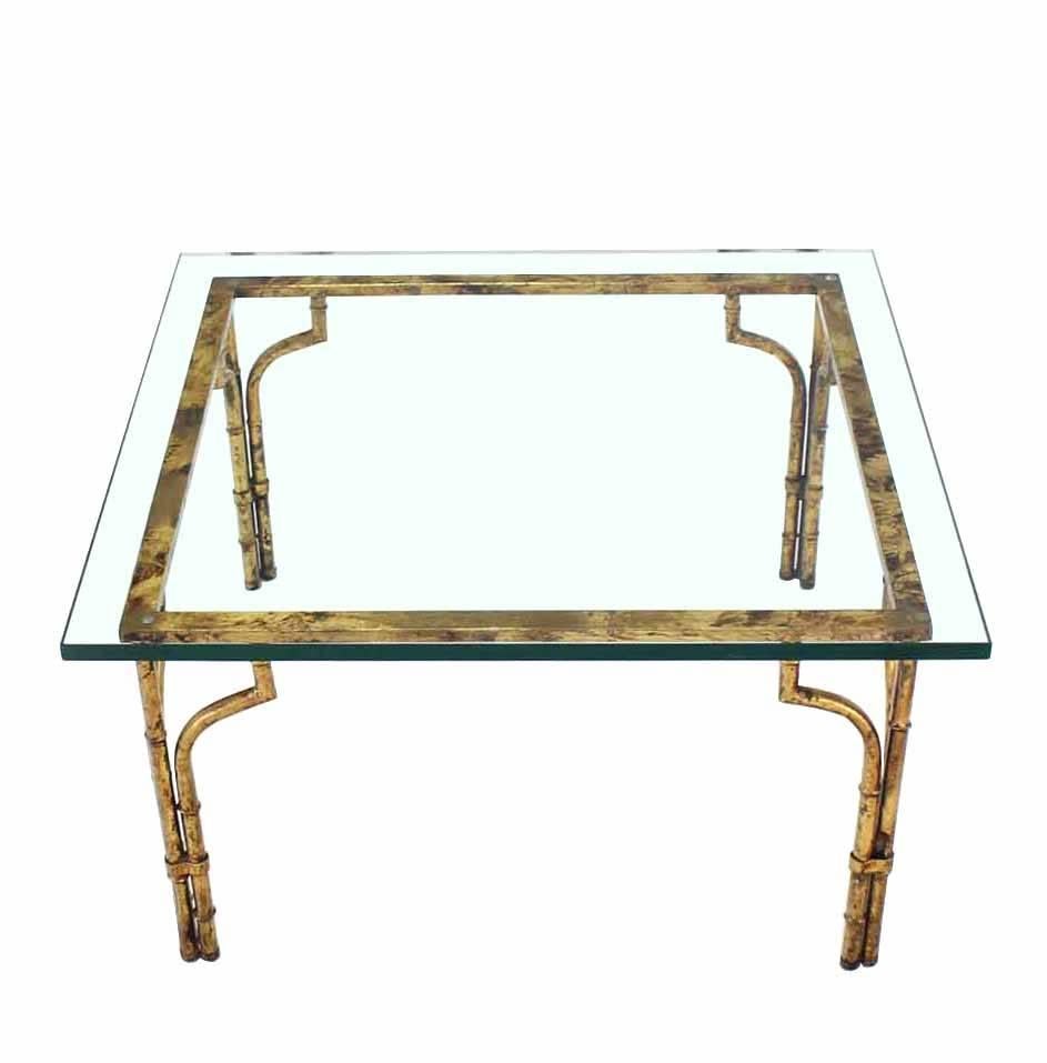 Nice Mid-Century Modern thick glass top gilt base coffee table.