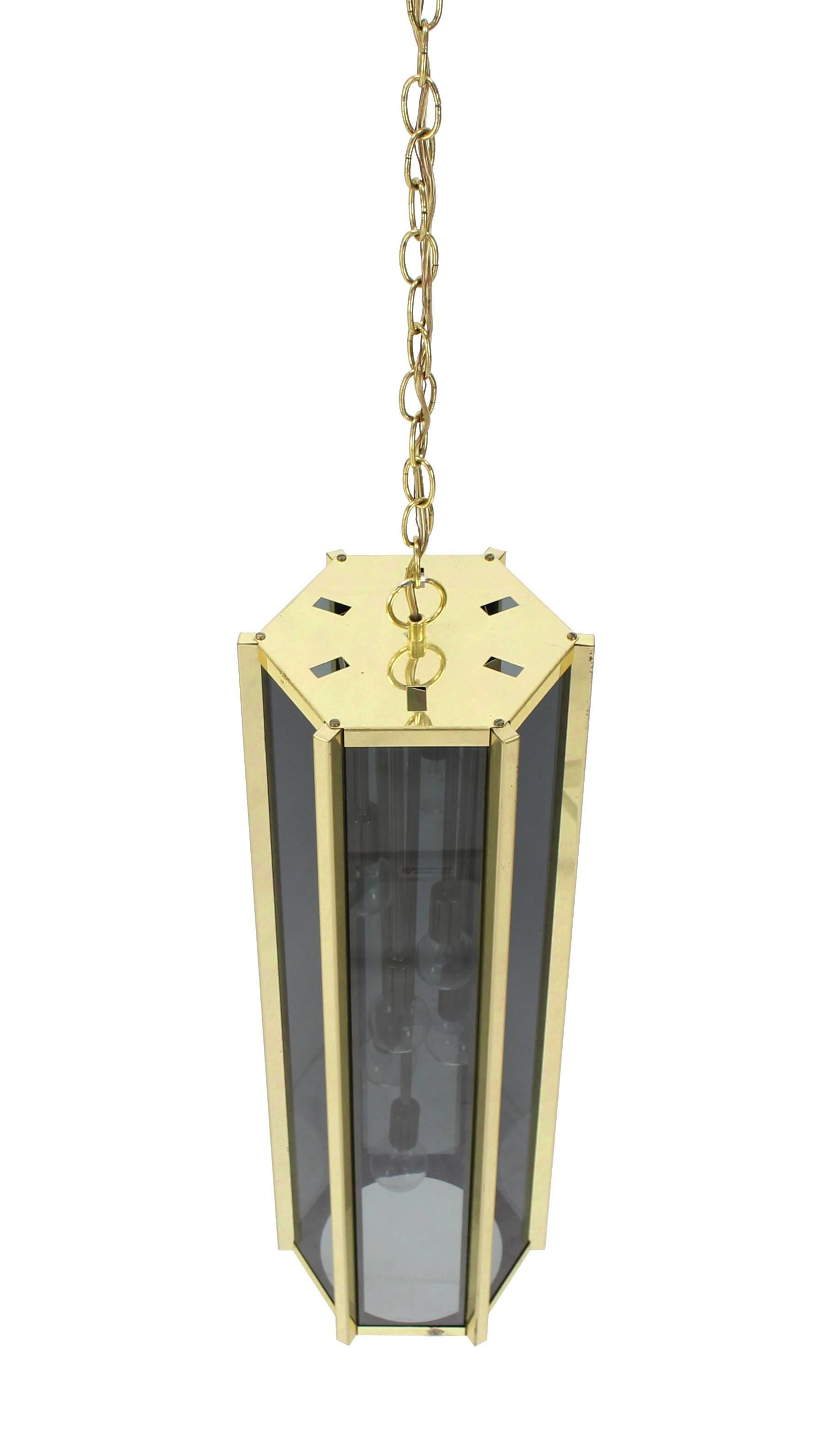 American Tall and Narrow Smoked Glass and Brass Pendant Light Fixture For Sale