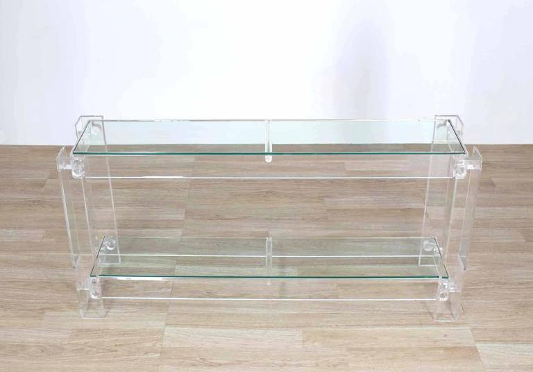 Very nice Mid-Century Modern long rectangle Lucite and glass console table.