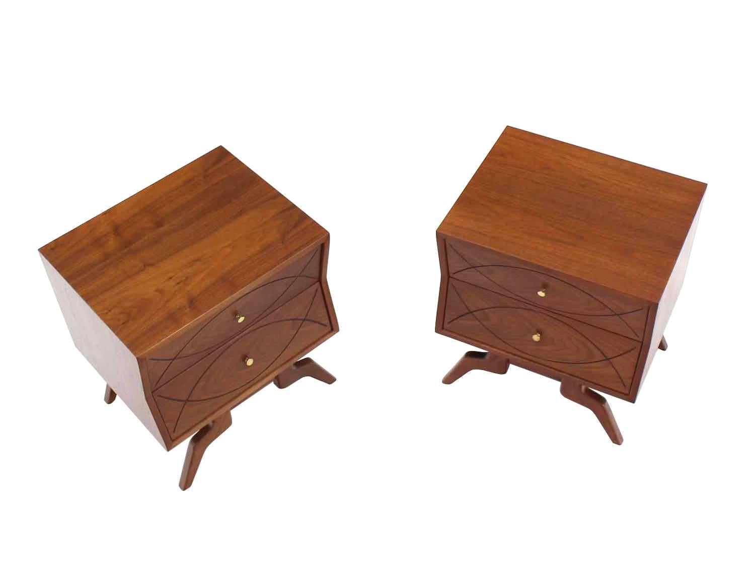 Pair of very nice Mid-Century Modern walnut end tables on splayed legs.
 