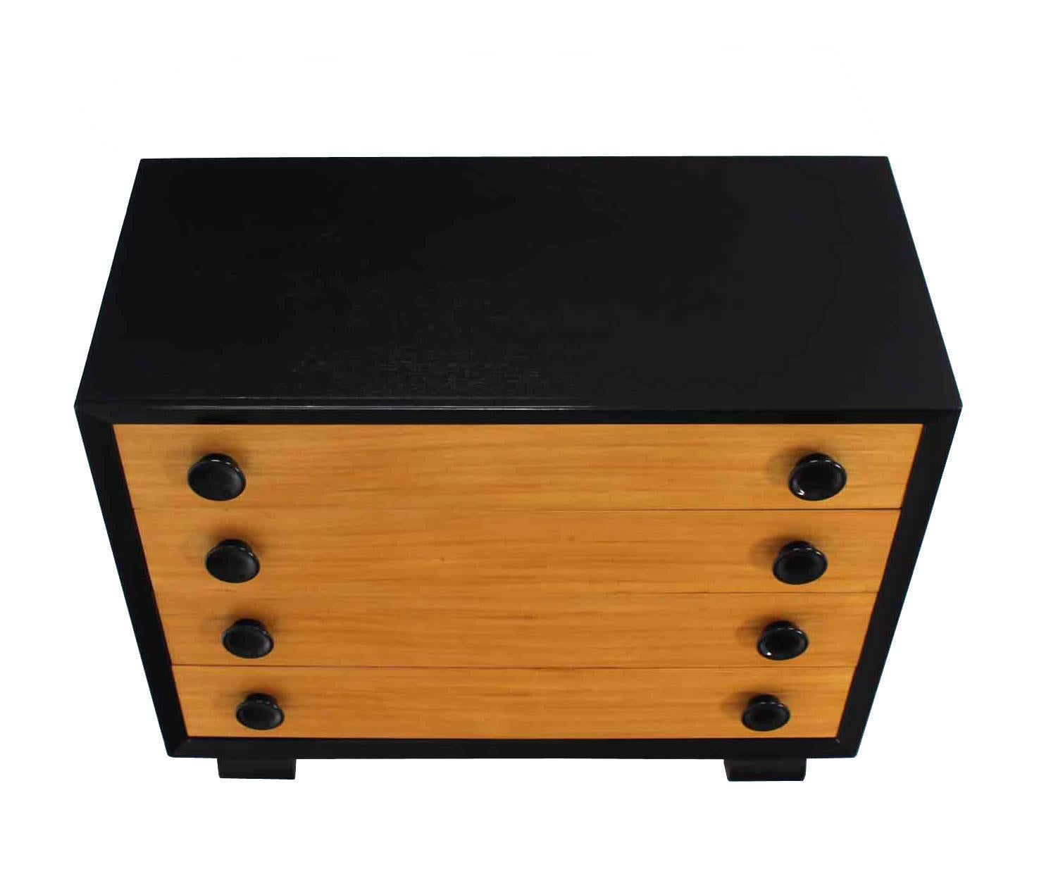 Very nice Mid-Century Modern Art Deco style two-tone black and gold lacquer dresser.
