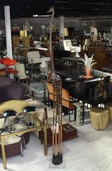 10' Tall Carved Sculpture of a Giraffe on Long Legs.