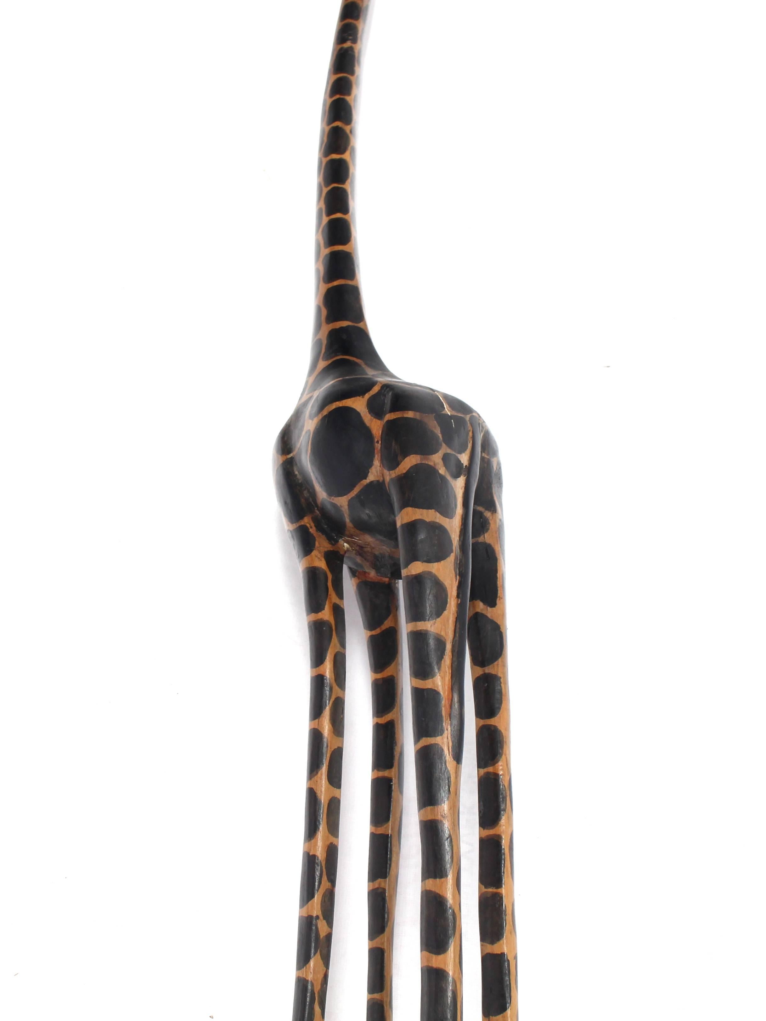 Mid-Century Modern 10' Tall Carved Sculpture of a Giraffe on Long Legs.