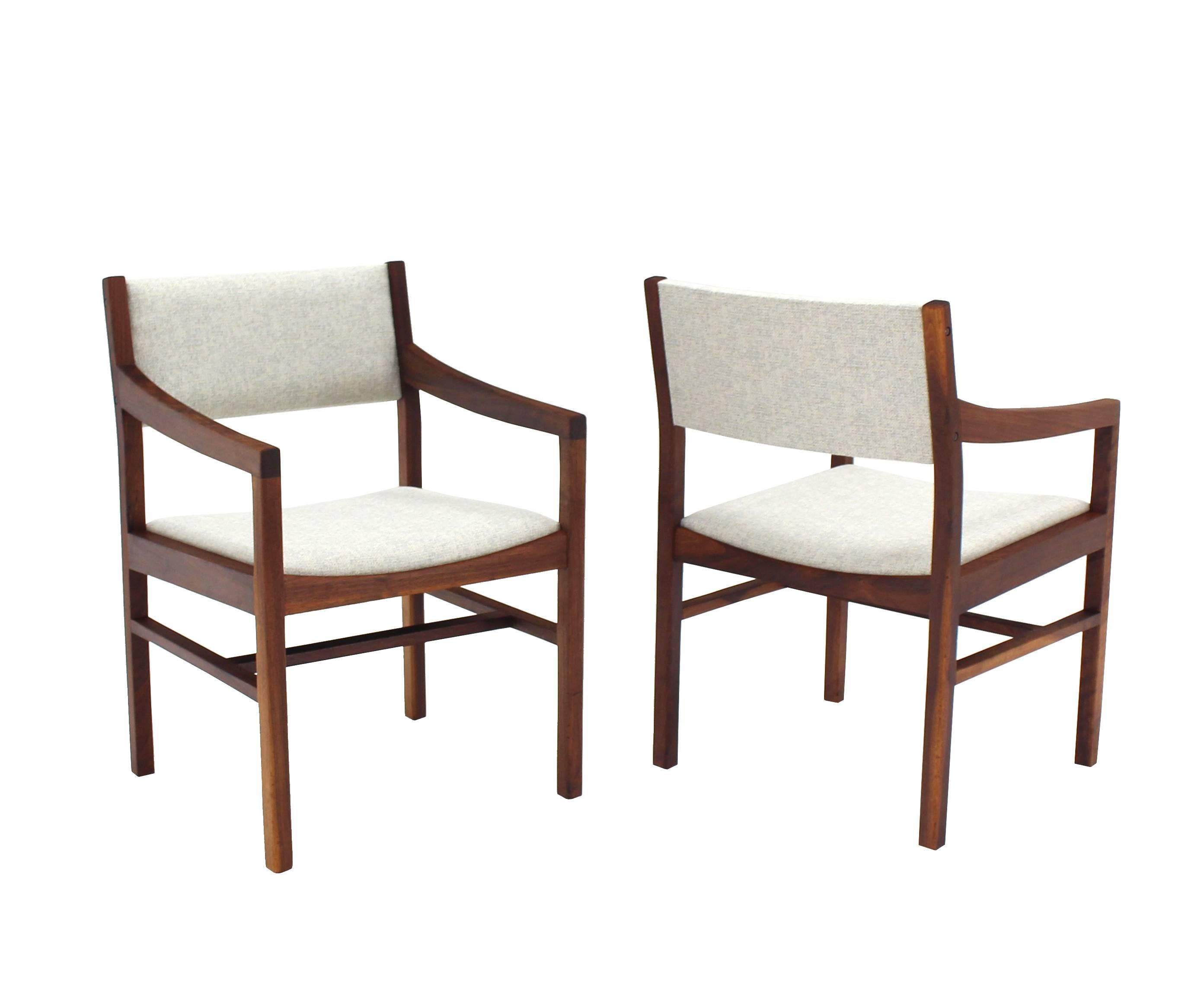 Pair of very nice Mid-Century Modern oiled walnut armchairs.