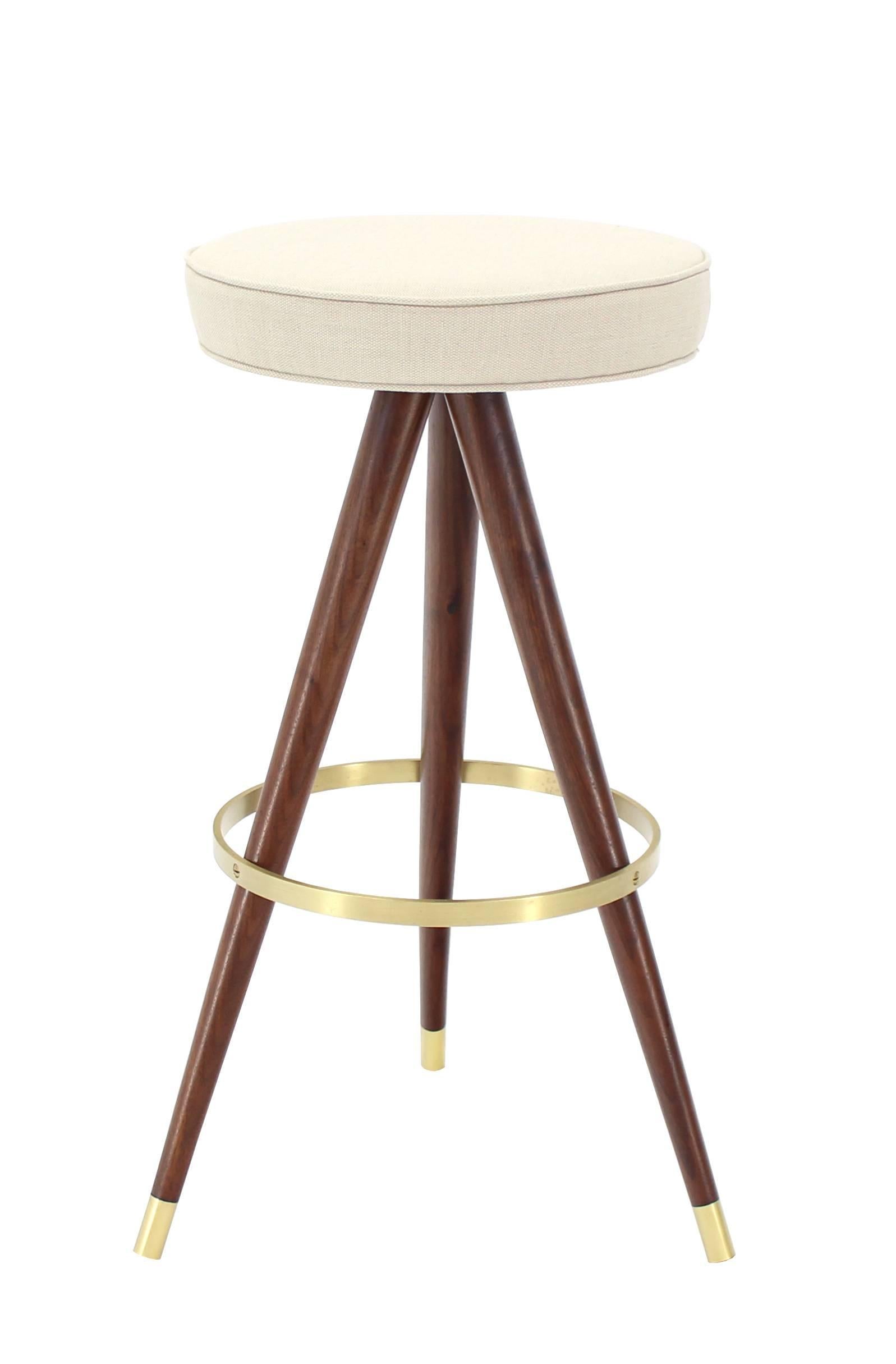 Set of Four Mid-Century Oiled Walnut and Solid Brass Tri-Leg Bar Stools In Excellent Condition In Rockaway, NJ