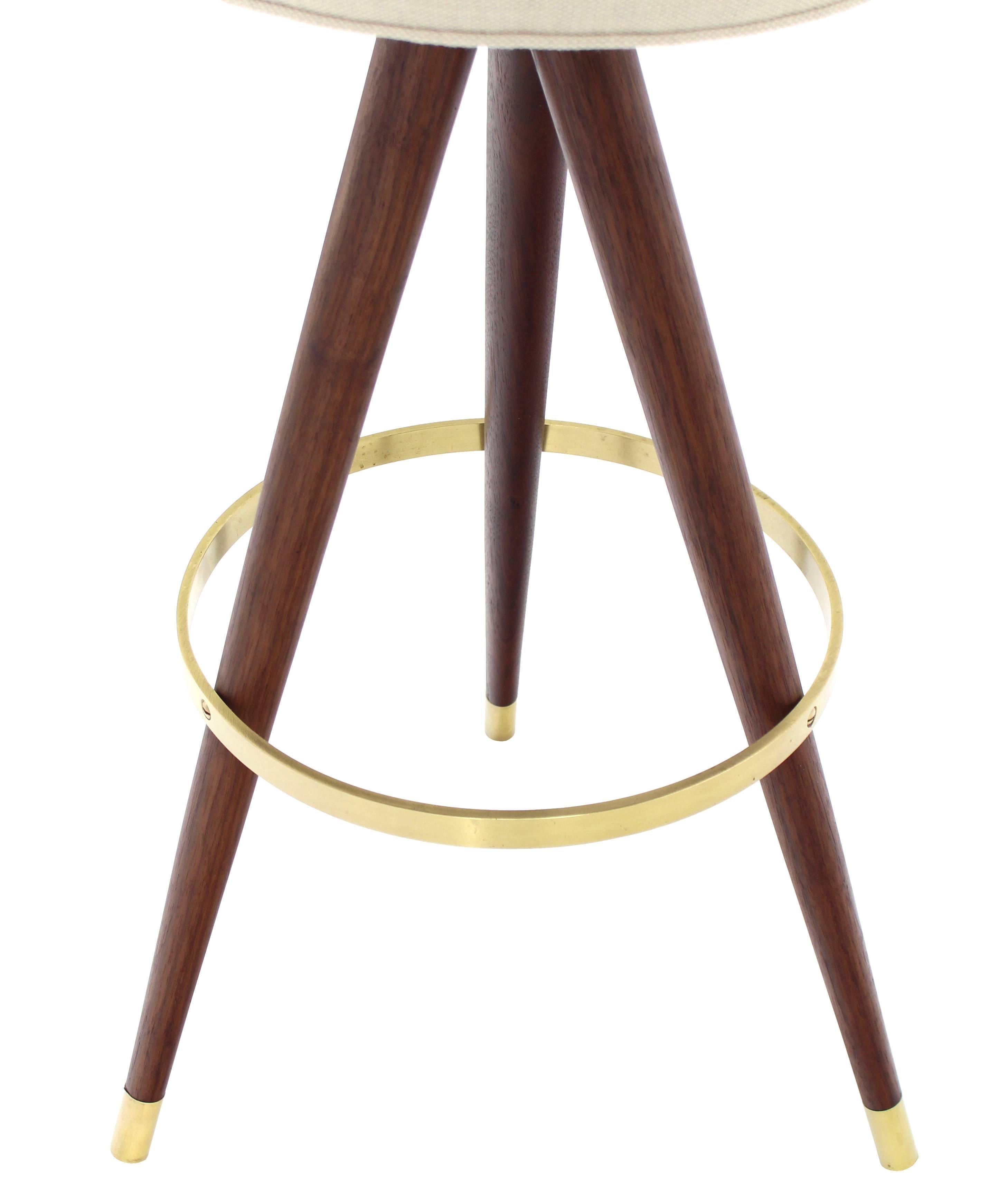 Set of Four Mid-Century Oiled Walnut and Solid Brass Tri-Leg Bar Stools 1