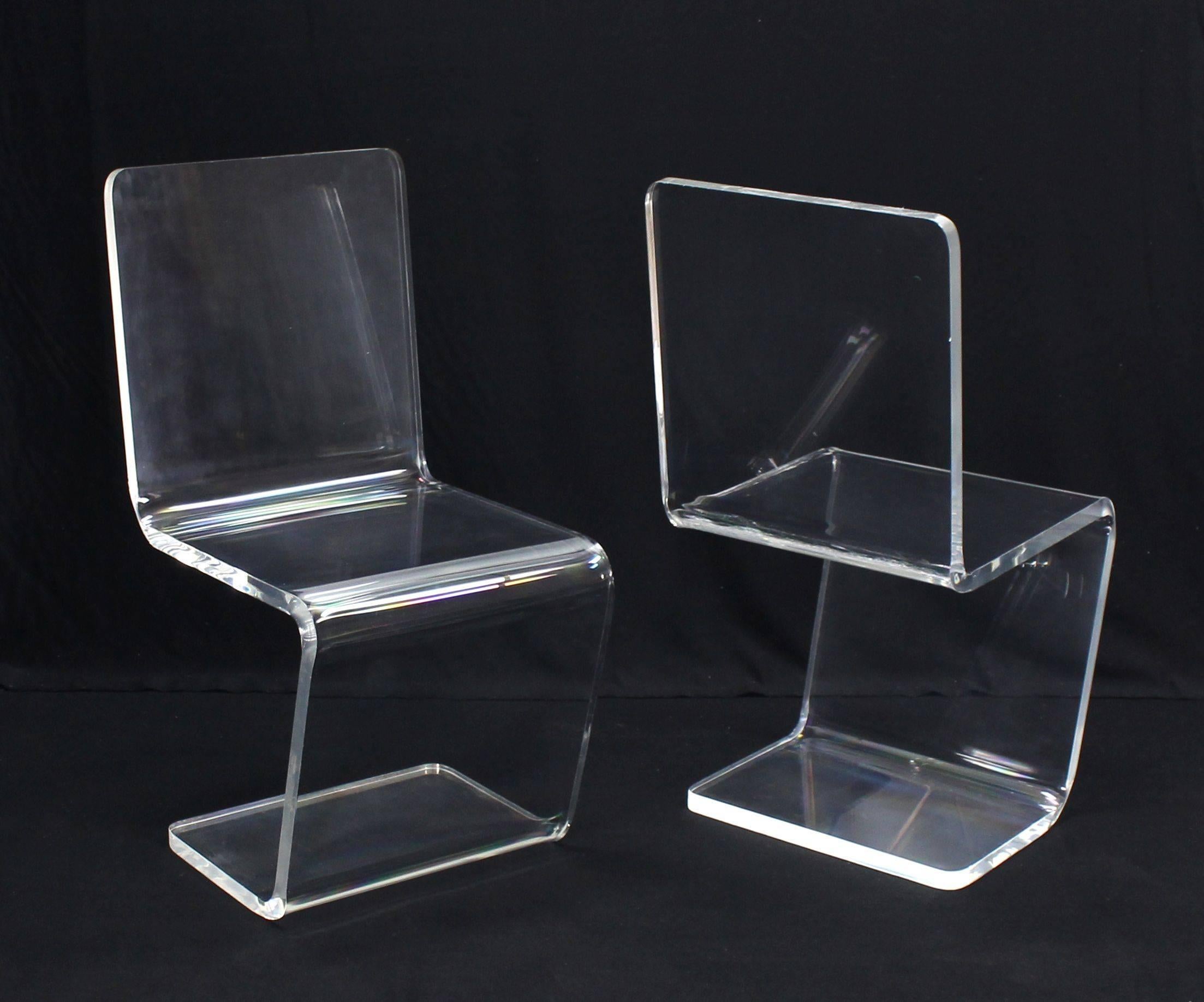 Very nice Mid-Century Modern set of Lucite dining chairs.