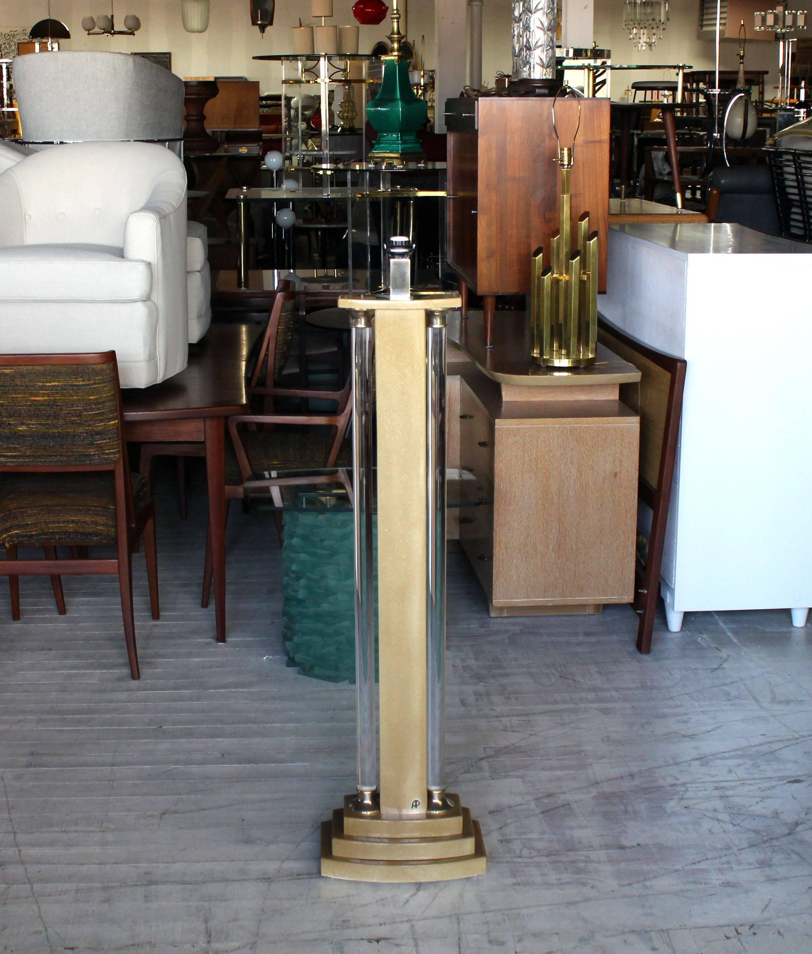 Lucite and lacqured base decorative floor lamp. No shade.