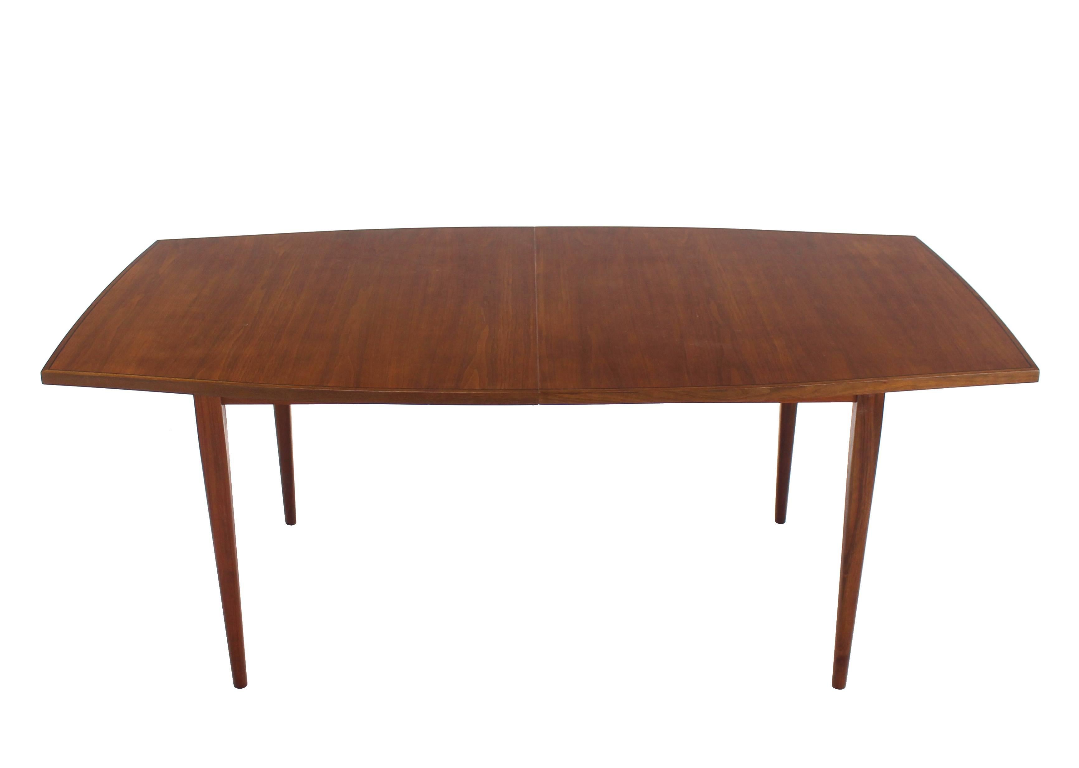 Very nice Mid-Century Modern walnut dining table by direction with 3 x 21