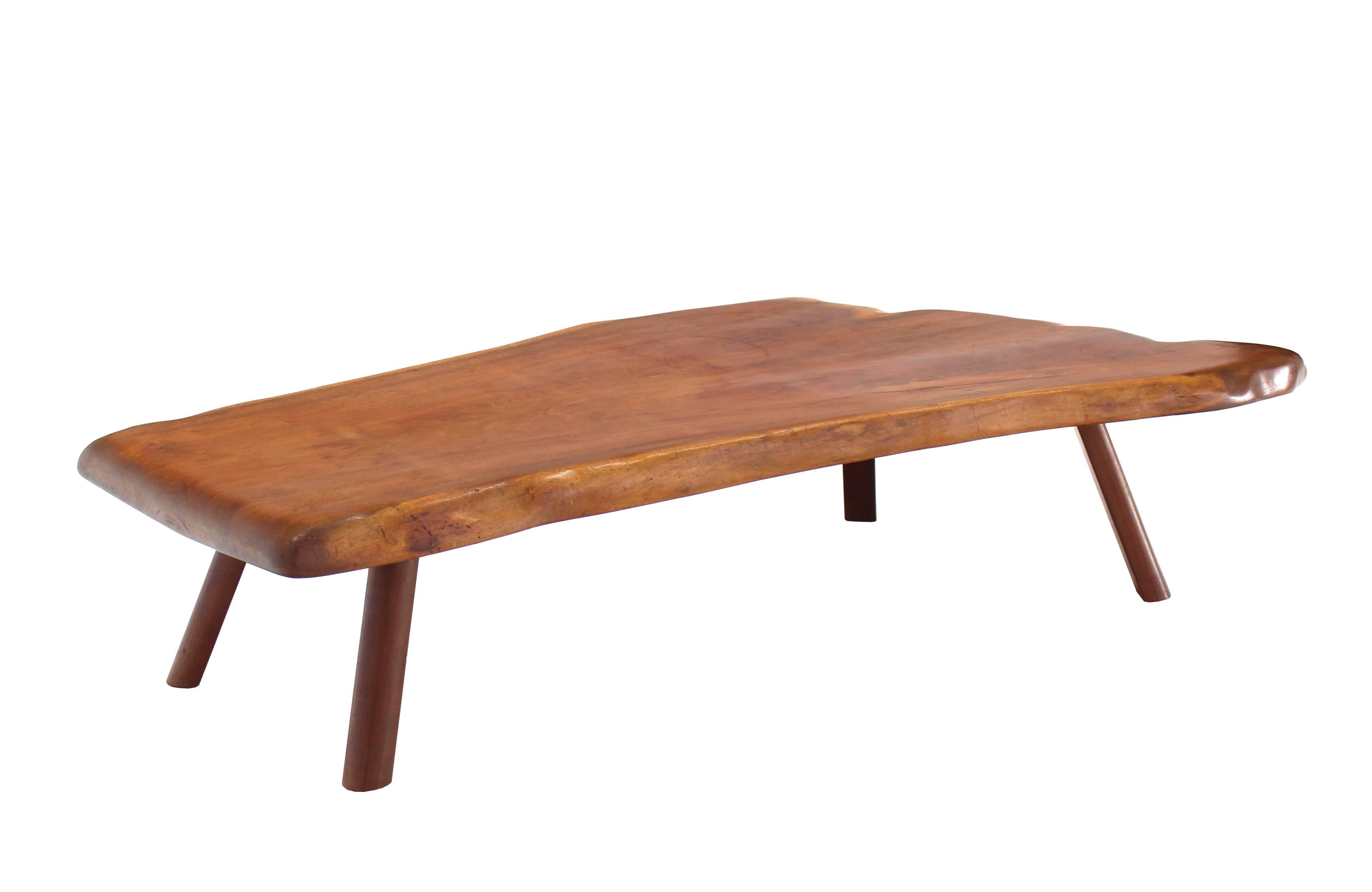 Natural Mid-Century Modern heavy slab wood top coffee table.
  