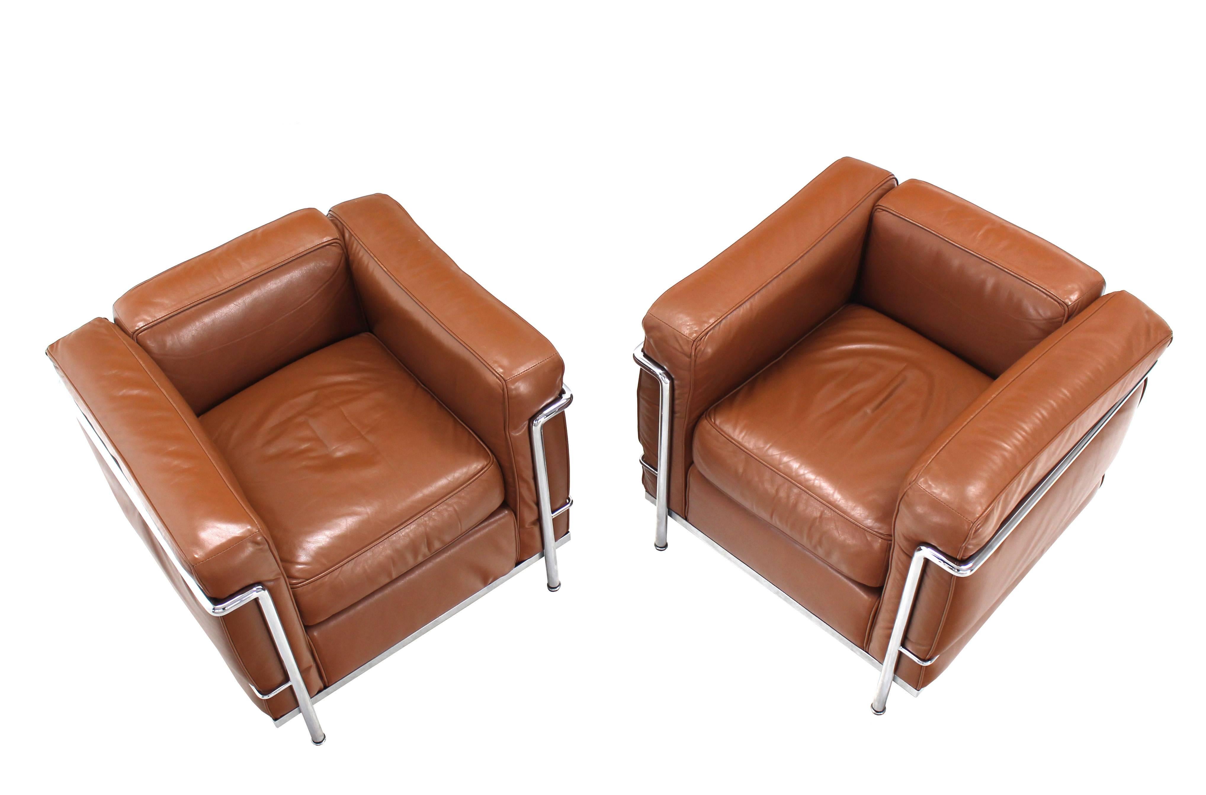 Authentic Cassina LC2 pair of chrome and leather lounge chairs.