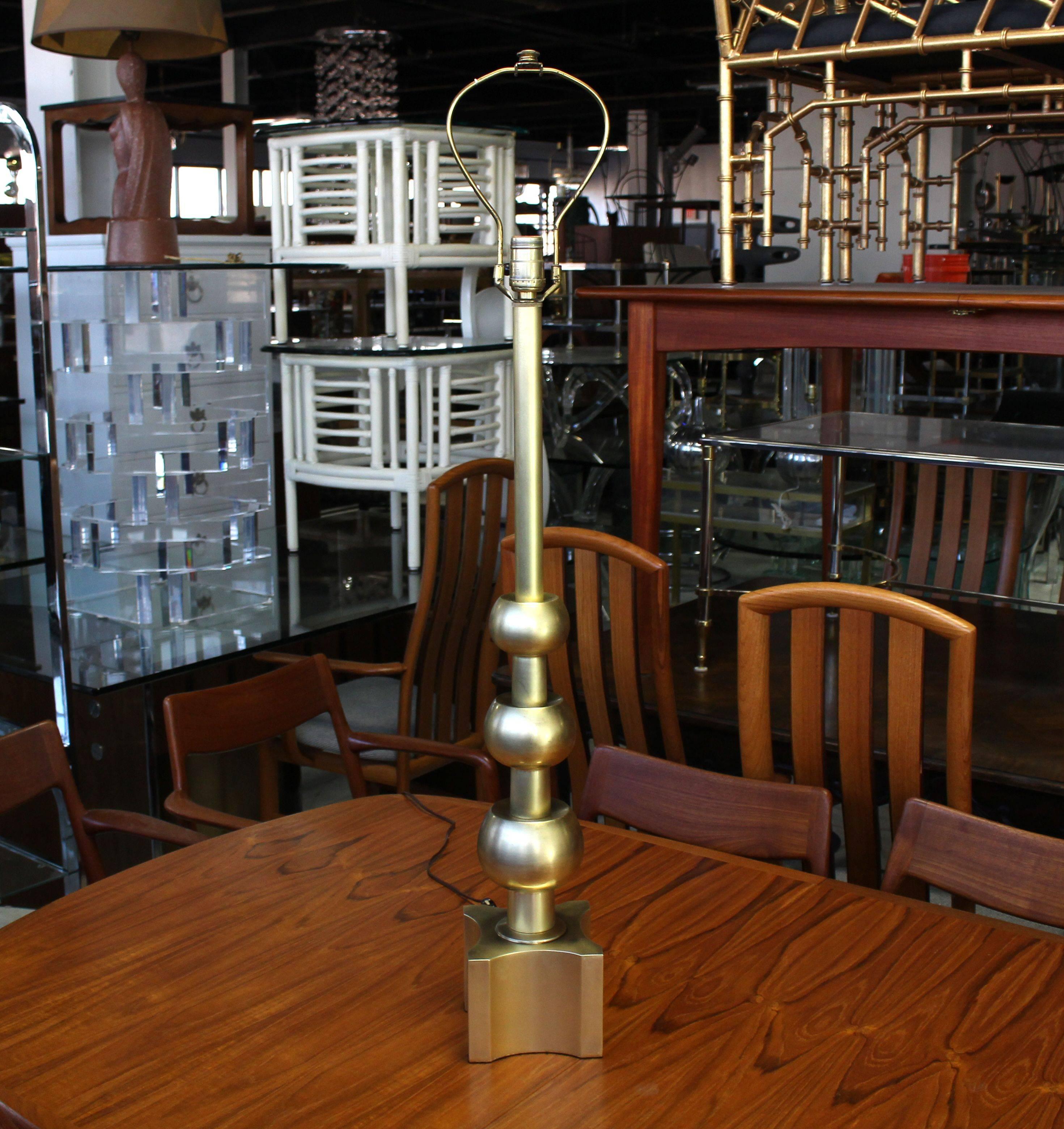 Tall sharp looking brass table lamp by Stiffel.