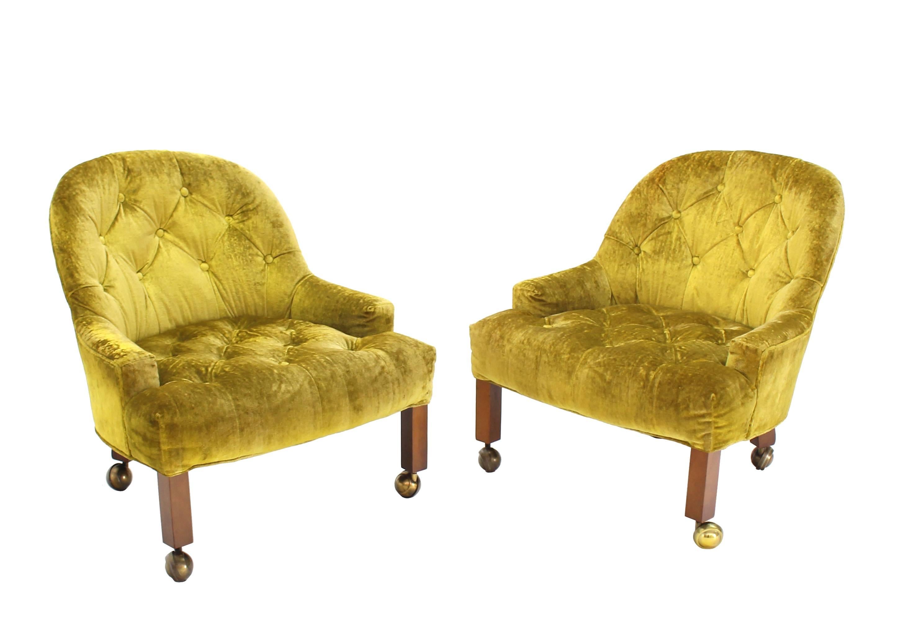Pair of very nice Mid-Century Modern velvet tufted upholstery lounge chairs.