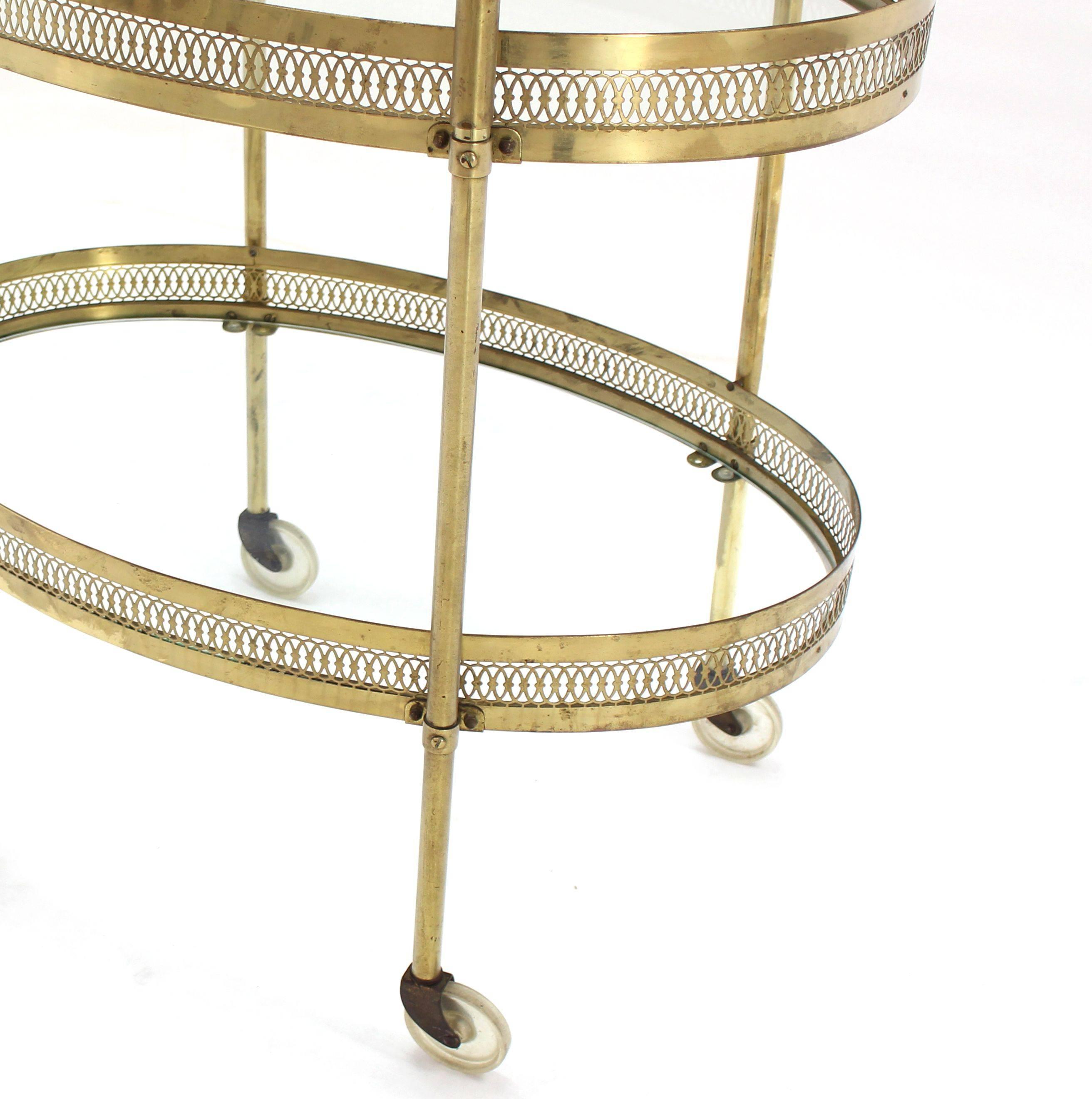 20th Century Oval Pierced Brass and Glass Two-Tier Tea Serving Cart on Wheels