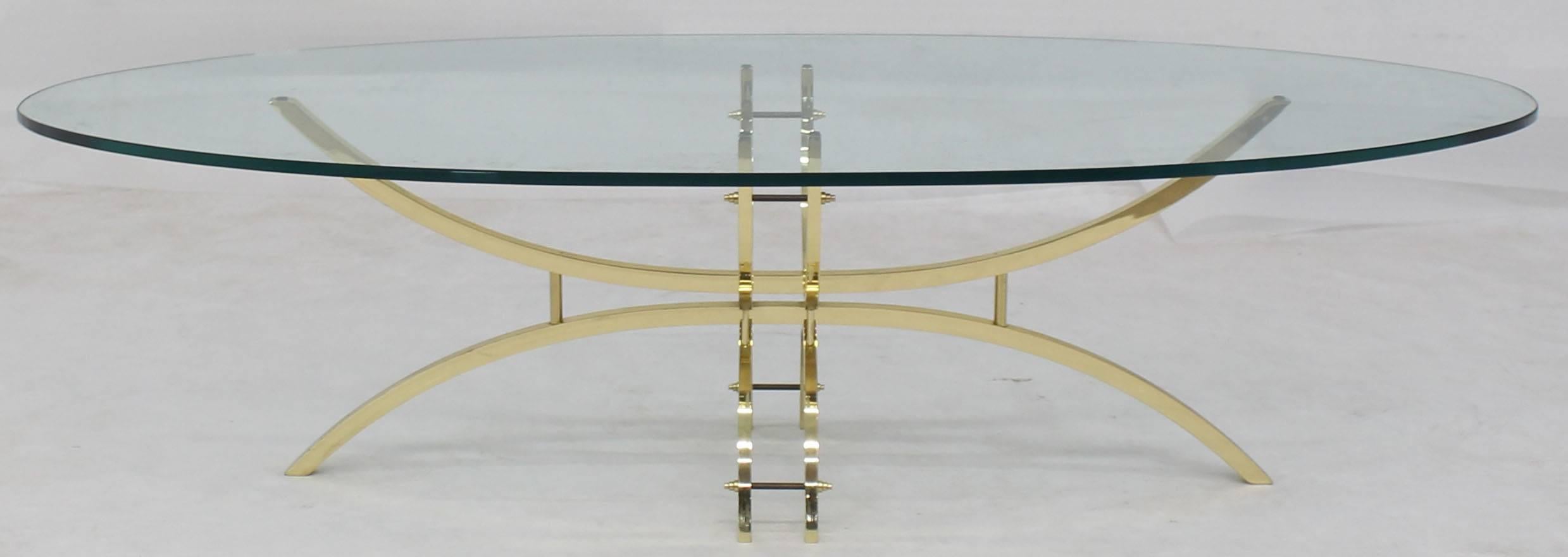 oval glass and brass coffee table