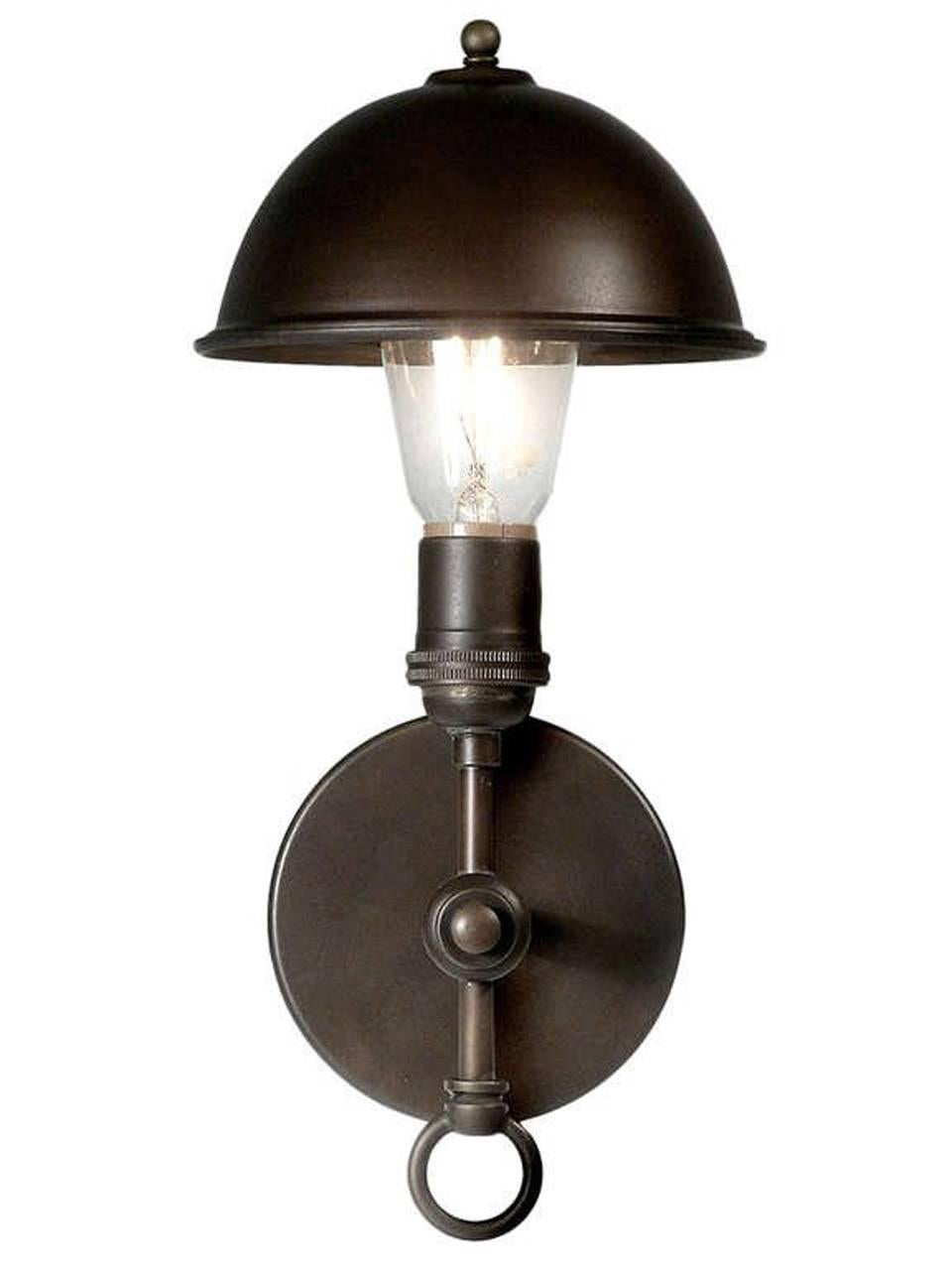 This lamp is so clean and simple it fits with almost any style. The 1920s style brass clip on Greist dome has a six inch diameter and can tilt in any direction.
