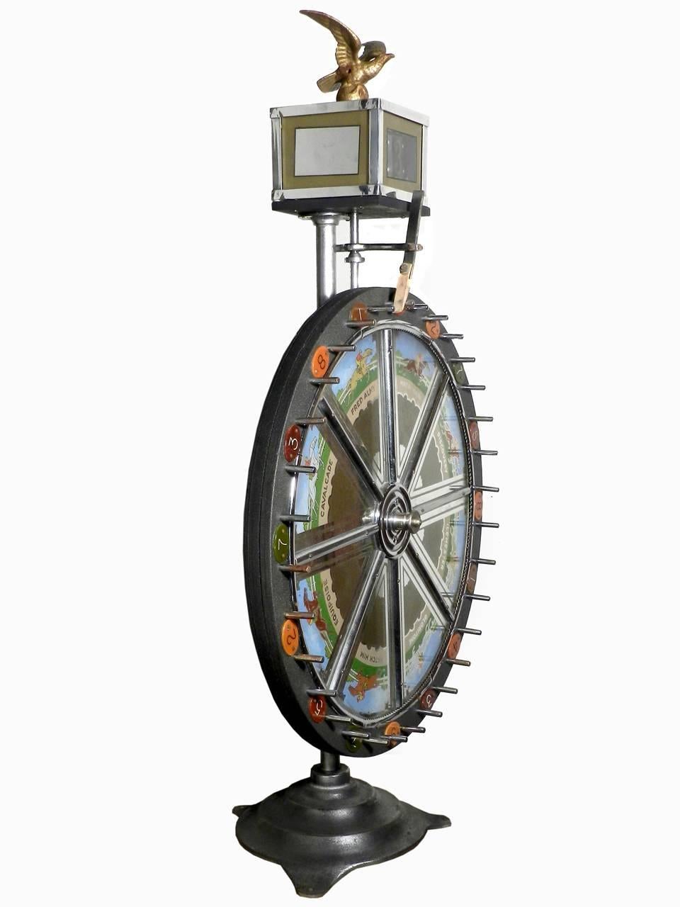 This is one of the most elaborate wheel of Fortune H.C. Evans & Co ever made. What makes this one rare is it's smaller size. These decorative wheels were handmade and top of the line. This example has all the original reverse painted glass and
