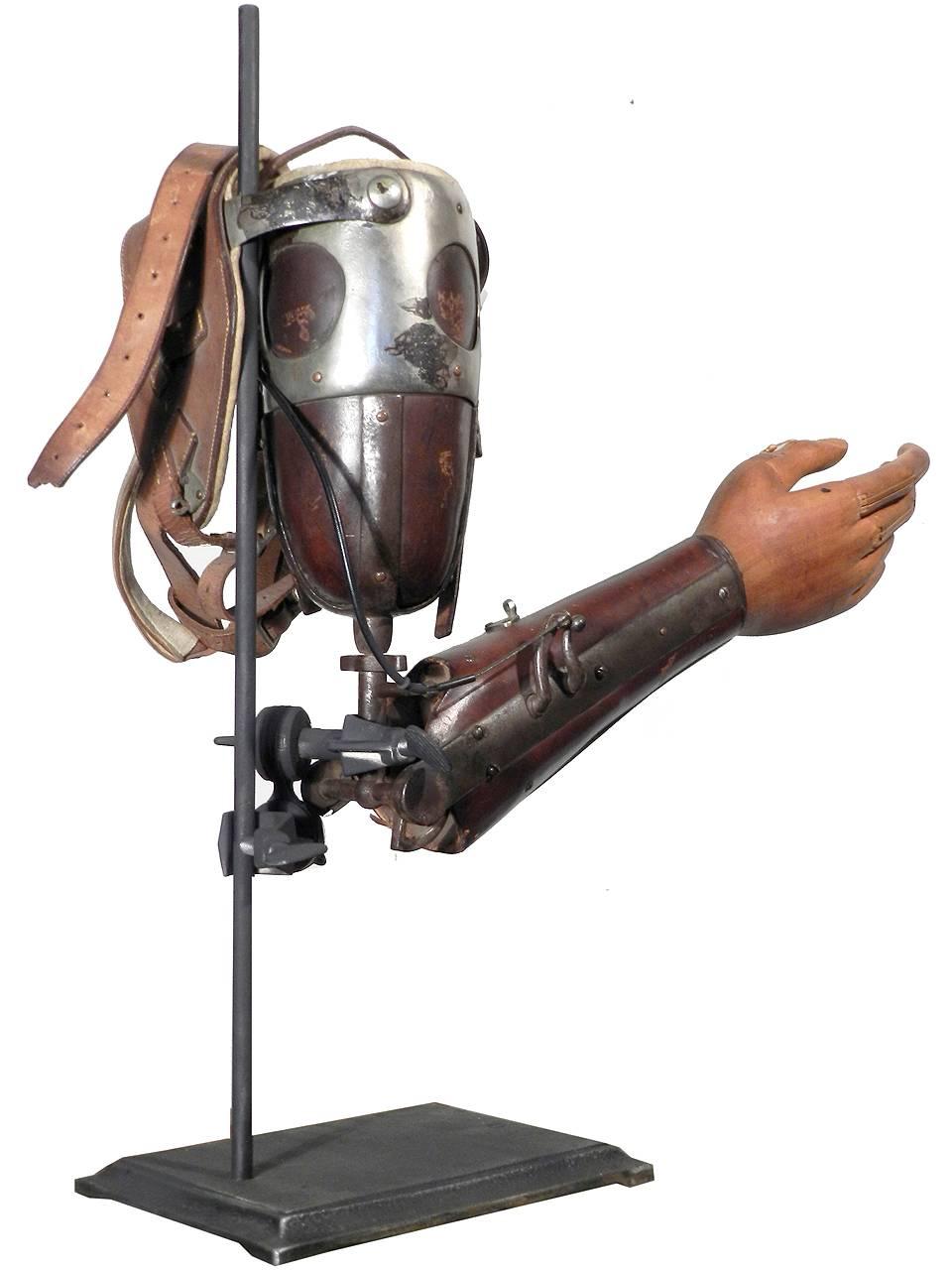 This is a very early and complex prosthetic arm. Made by Anderson & Whitelaw Ltd. Birmingham England C. 1914-1918. It has an 