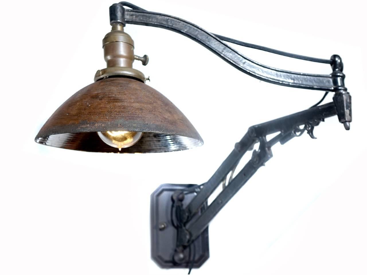Early Cast Iron Articulated Arm Wall Lamp In Excellent Condition In Peekskill, NY