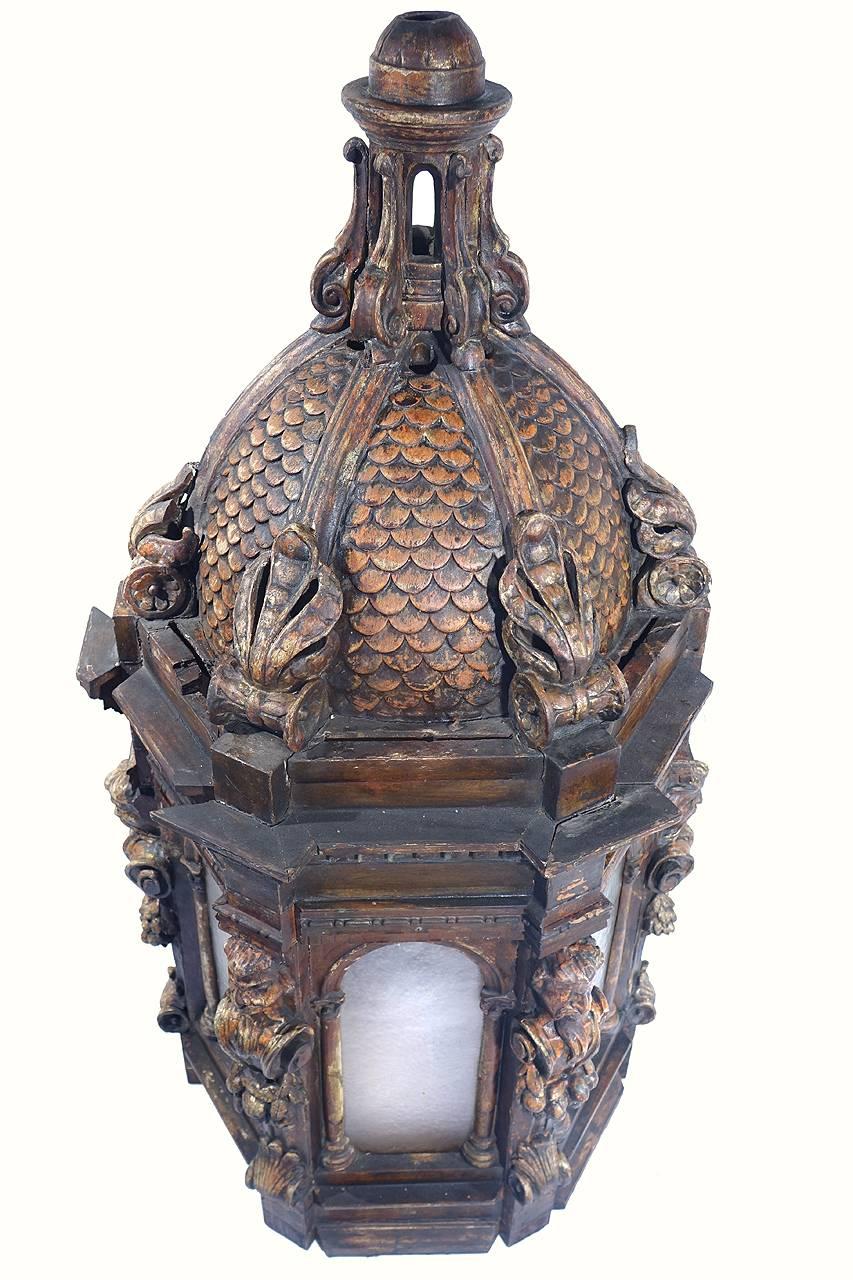 This lantern probably hung in the portego of a Venetian palace, the large, first floor room used for grand entertainments such as weddings or dances. Its opulent carving in the mannerist style would have combined with other gilded and painted