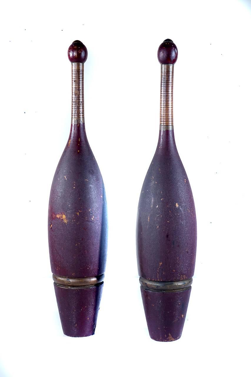 This is a wonderful collection of ten Victorian Era Indian Clubs. There are five matching sets plus a number of unique examples all in excellent original paint with a beautiful patina. They range in size from over two foot to 16 inches. As a group