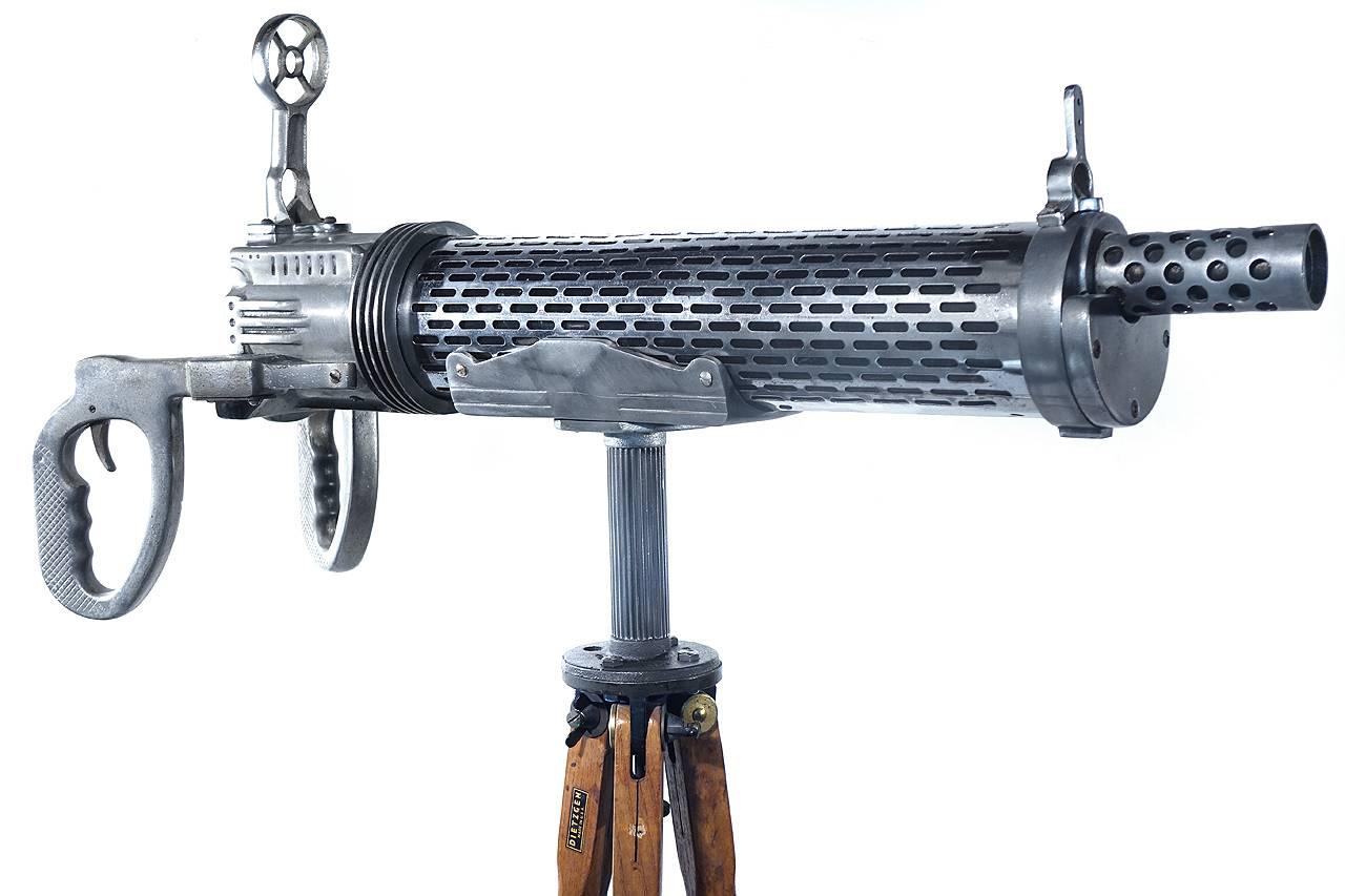 I grew up in Coney Island so these early arcade items really bring back memories. This is one of the rare 1939 Keeney Arcade Anti-Aircraft Machine Guns… very high style Deco. We mounted the gun to an early wood tripod and it makes an impressive
