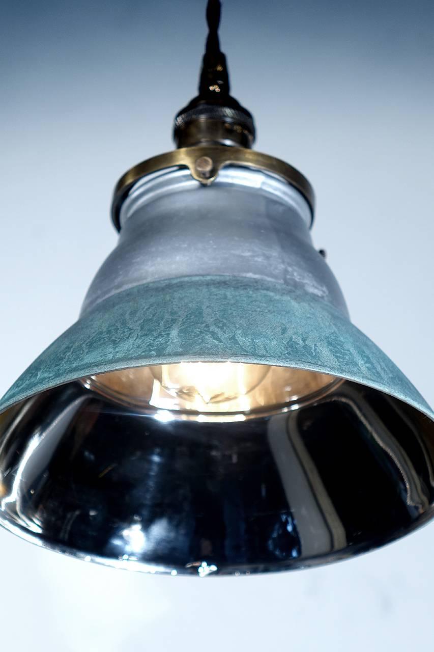 We have a nice collection of these original and unique mercury glass pendants. The inside is mirrored and the outside has a copper plating that has a Verdigris patina finish. The look is rustic and unlike anything else we have offered, these lamps