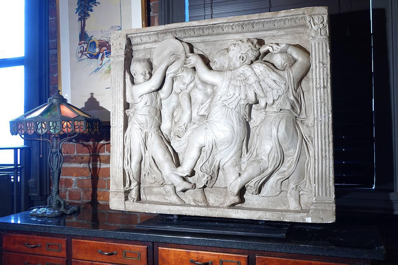 This is a beautiful early plaster detail salvaged from the interior of New York City's Bowery Bank. Its over 3 foot wide and stands on a custom museum style display stand. It was left as is with the original patina. These delicate and striking