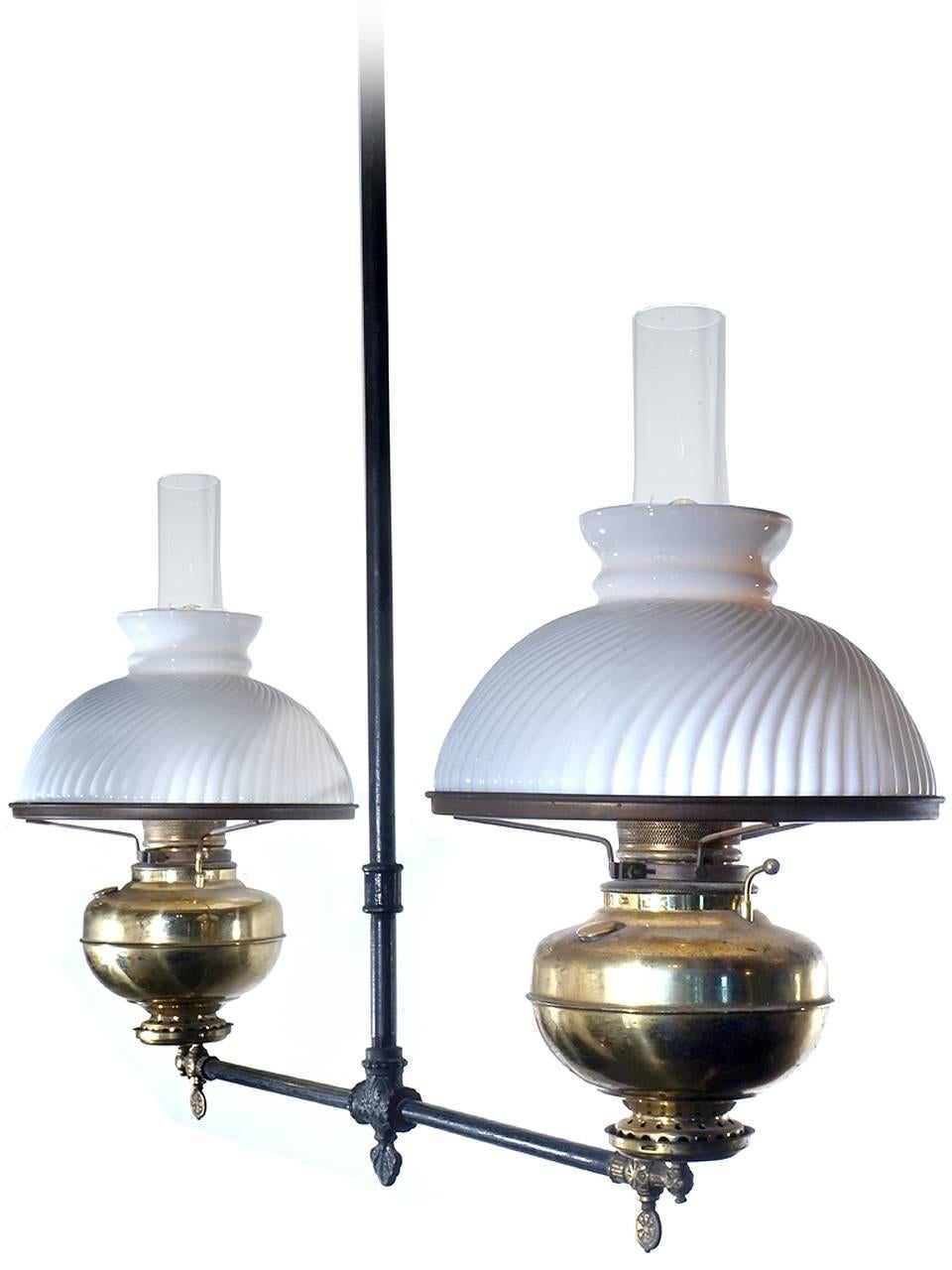 This lamp retains all the original details including the key valves, glass brass lanterns and fittings. When the fixtures were wired to take standard bulbs we wanted to keep the early character.