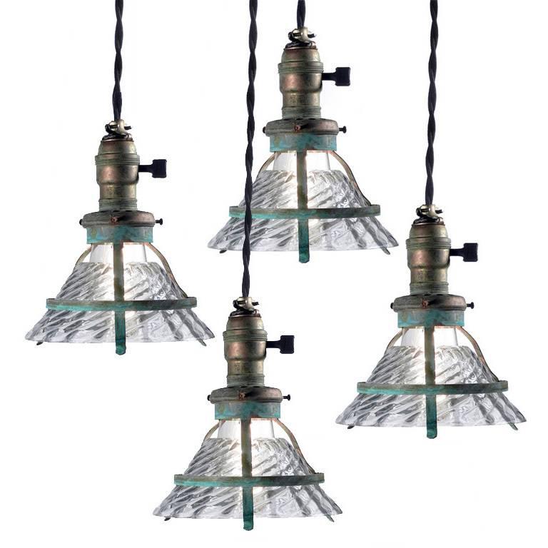 This is a unique Industrial snap-in shade fixture. I believe these were made by the X-Ray Lamp Company. They have an elegant and complex Industrial look. They have a 6.6 inch diameter shade and standard size brass socket. This shade has been acid