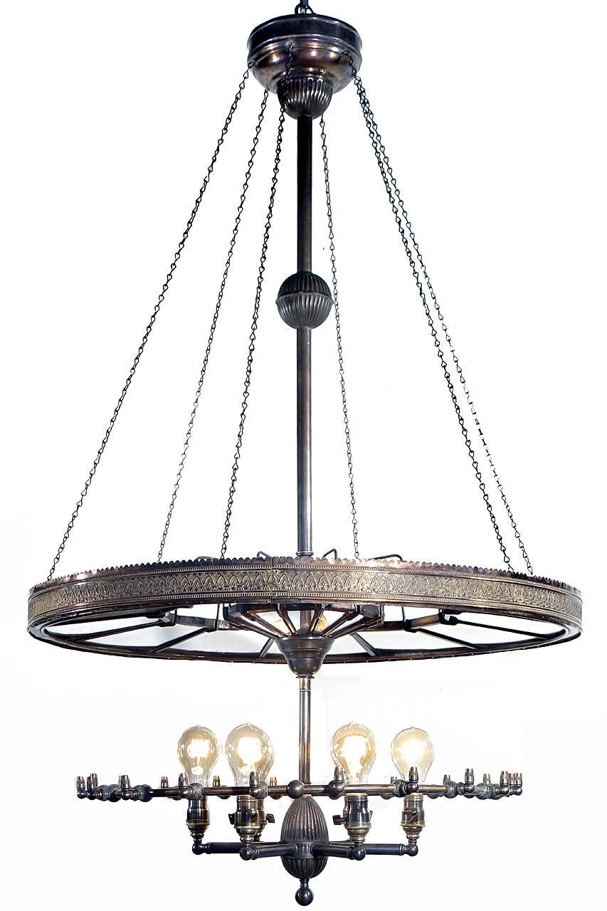 I've been doing this a while and in all the years we have only found one other example of this rare I. P. Frink Reflector. The double mirrored ring of reflectors has a 34 inch diameter. These early mirrored shade fixtures are super rare and