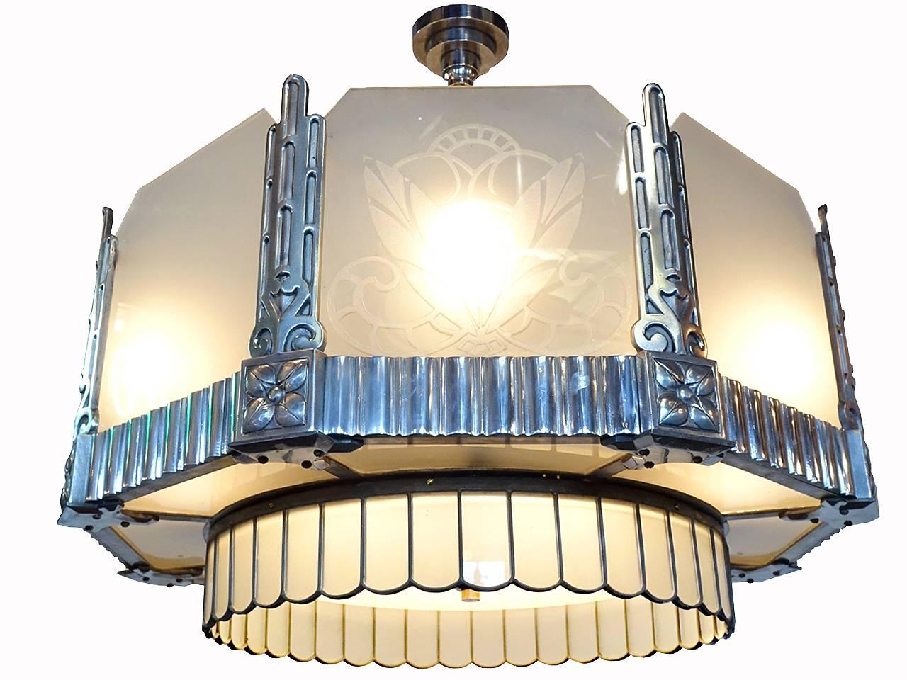 This is a matching set of three Art Deco lamps. If you collect early brass blade fans then you already know this is as rare as it gets. The collection includes one large decorative chandelier and two matching ceiling fan lamps. These were designed