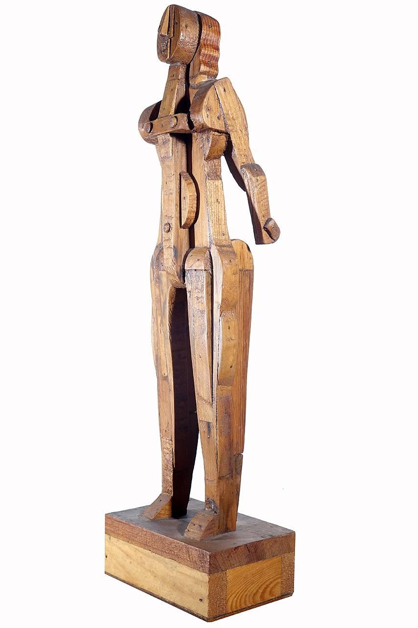 This striking sculpture of a nude woman is named Amazon. Both the work and artists name J. Clark are penciled on the bottom of the base. The work is striking and very well done.