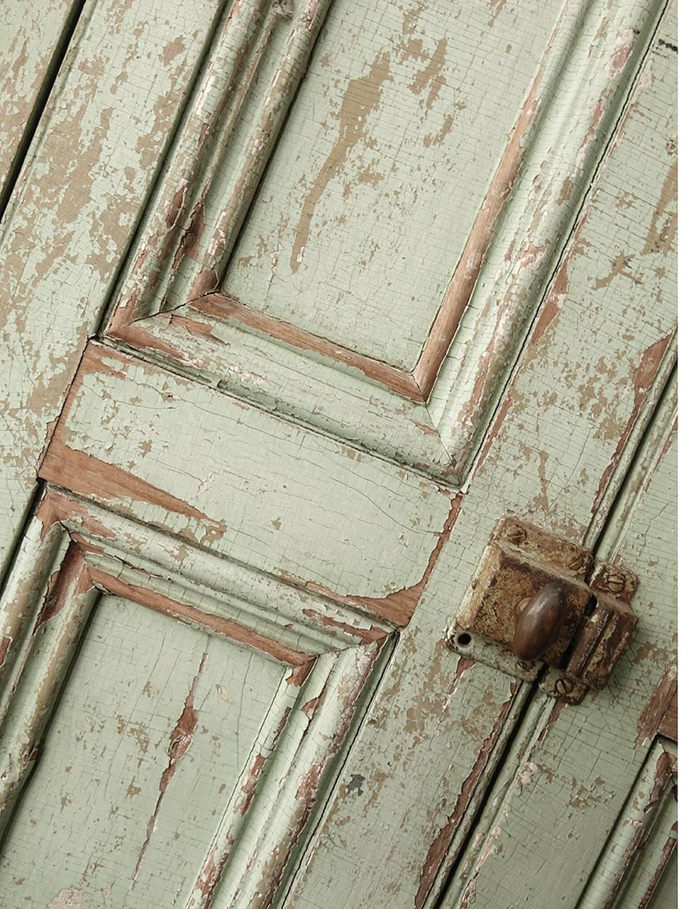 This is just the way we like to find these early farm cupboards. The bottom edge has some rough edges. The original paint is mostly there with a wonderful aged patina. The pale green is a pleasing color plus the contrasting wood showing through the