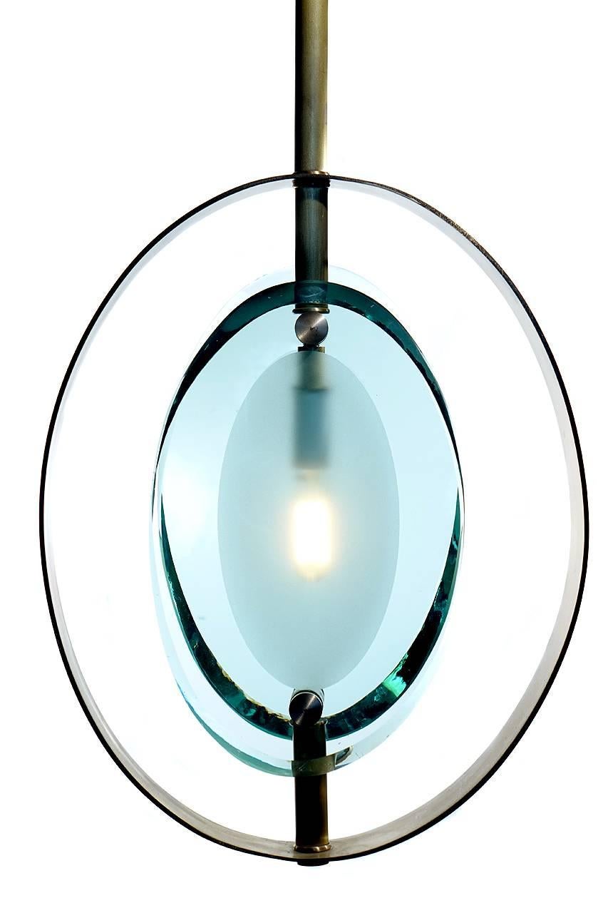 This is a striking high-style ceiling lamp that is extremely well made. It is not signed but looks like a Max Ingrand design for Fontana Art. That said on close inspection we are sure this is not Fontana Art but a late 20th century lamp inspired by