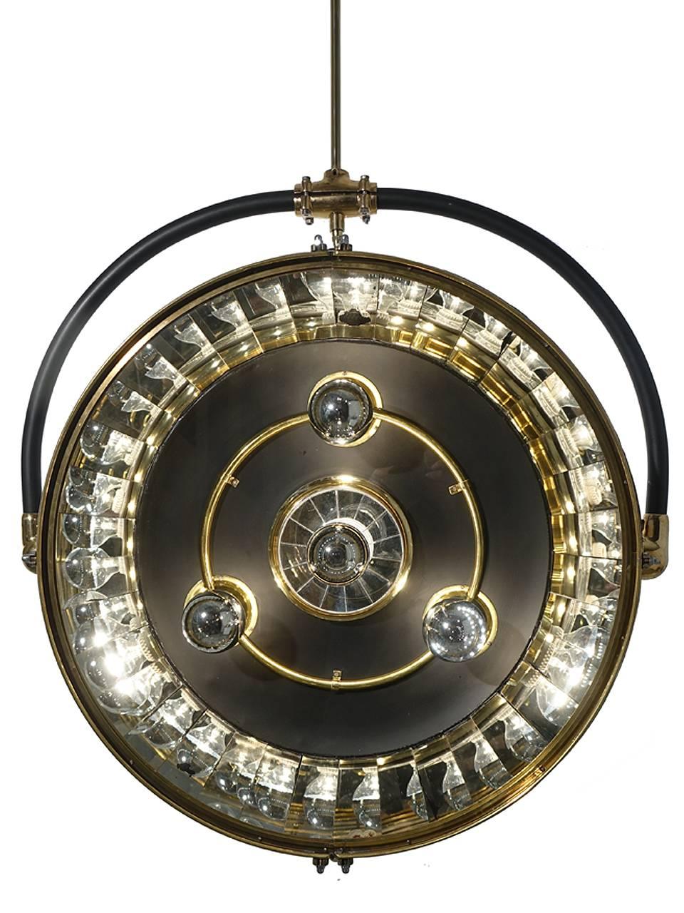 These rare French Scialytique operating room lamps are very difficult to find. We're always looking and were lucky to find this perfect example. The one pictured above is a large showy chandelier with an impressive 27 inch diameter. There are almost