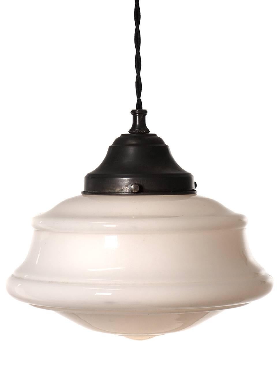 The small-scale and unique design of this lamp make them a standout. The shade is white milk glass. You can change the look of the lamp with either a warm or cool tone bulb. There is only one lamp left.
