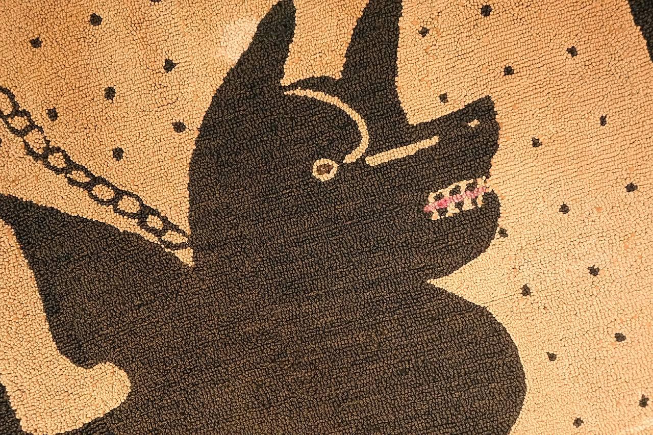 When I saw this Bad Dog rug I couldn't help myself. It makes me laugh every time I look at it. I think it may be midcentury and a real compelling outsider piece of art. Someone took loving care of it because it was repaired a few times. You can see