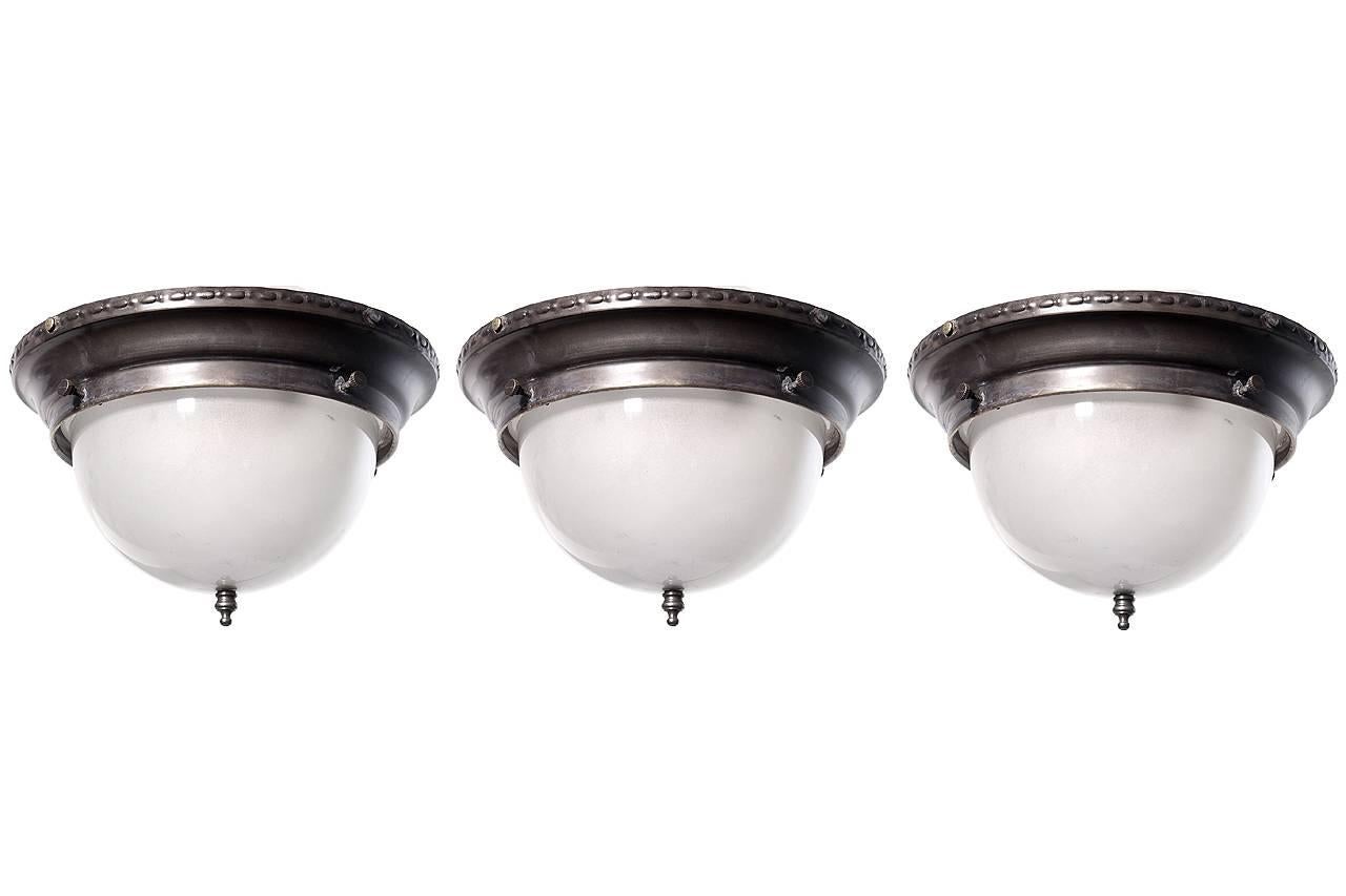 We have a nice collection of these 10.5 inch domed flush mount lamps. Each take two candelabra bulbs and have simple period decorative details.