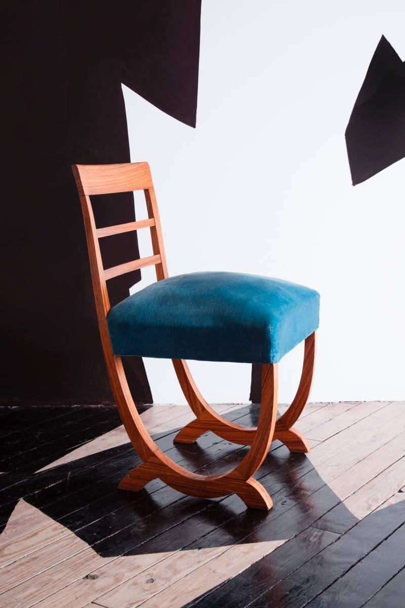 Of veneered and carved rosewood. 

Fritz August Breuhaus de Groot has been the leading architect translating the new objectivity style into design. In his publication 