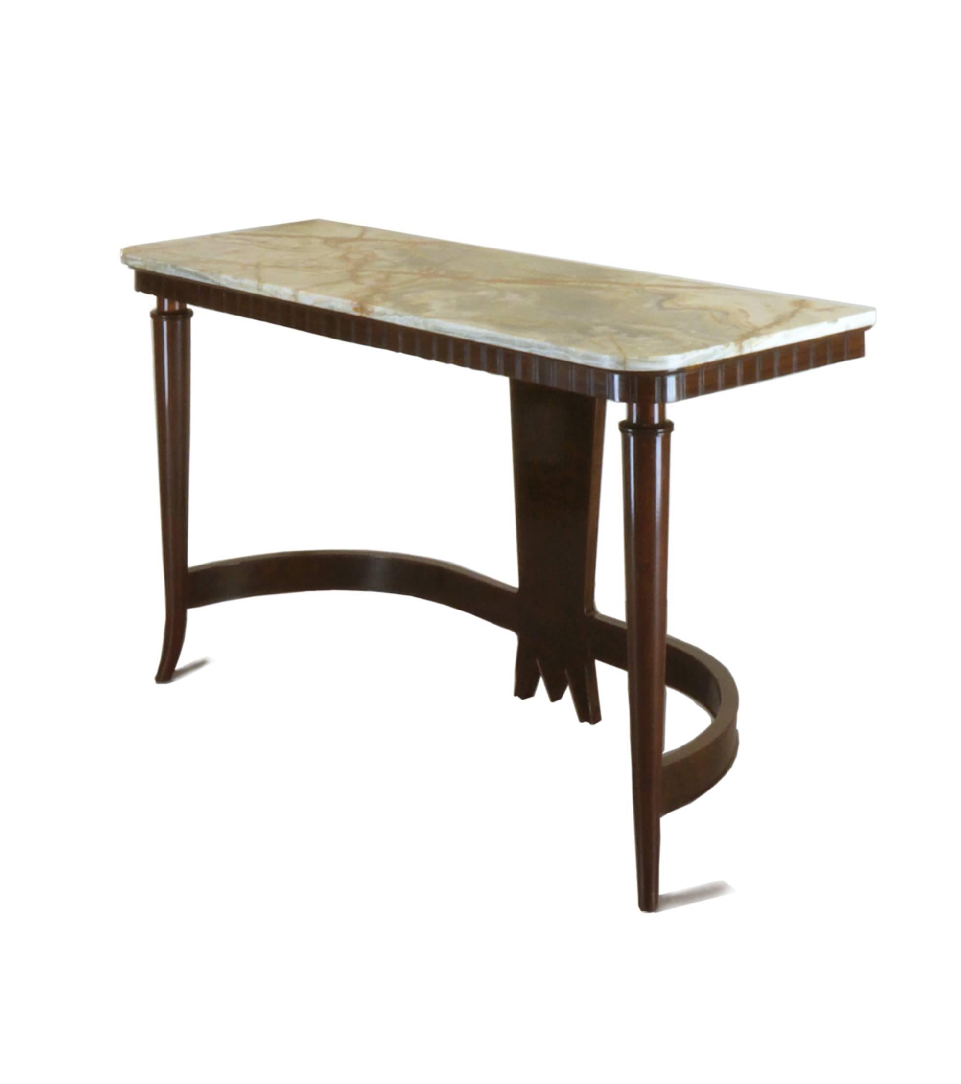 A walnut and onyx console table by Luigi Scremin. Combining elements of neoclassical and medieval design.
