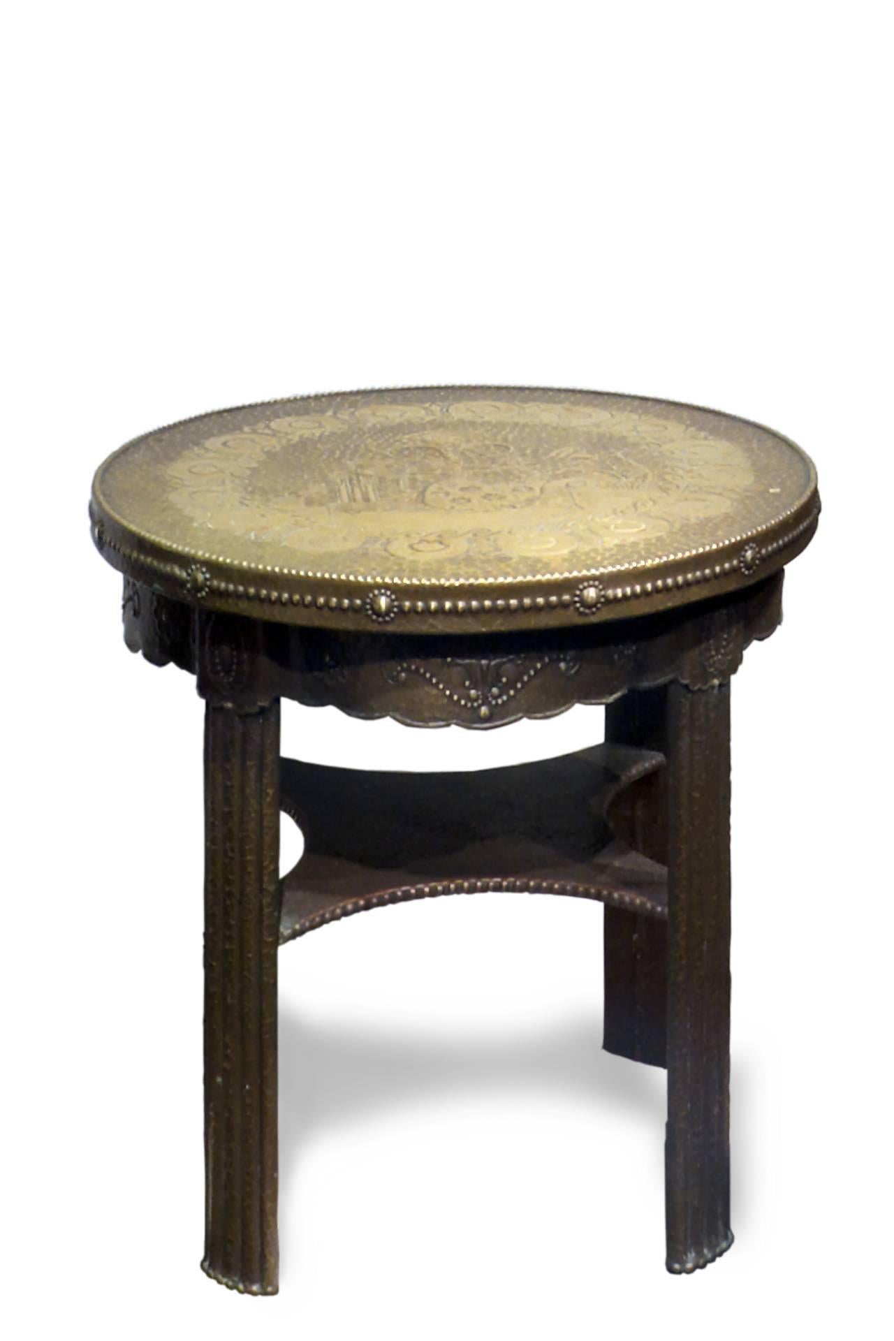 Repoussé brass covered Art Deco side table.