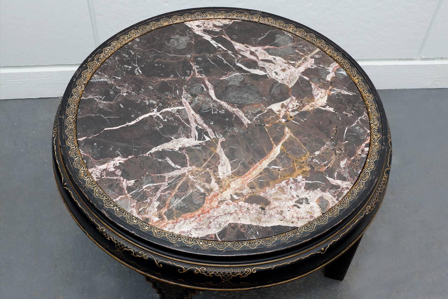 A marble and lacquer chinoiserie Art Deco table by Peter Baumann.