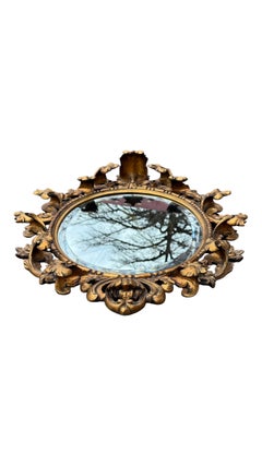 Italian Rococo Carved Giltwood Oval Mirror, 1900s