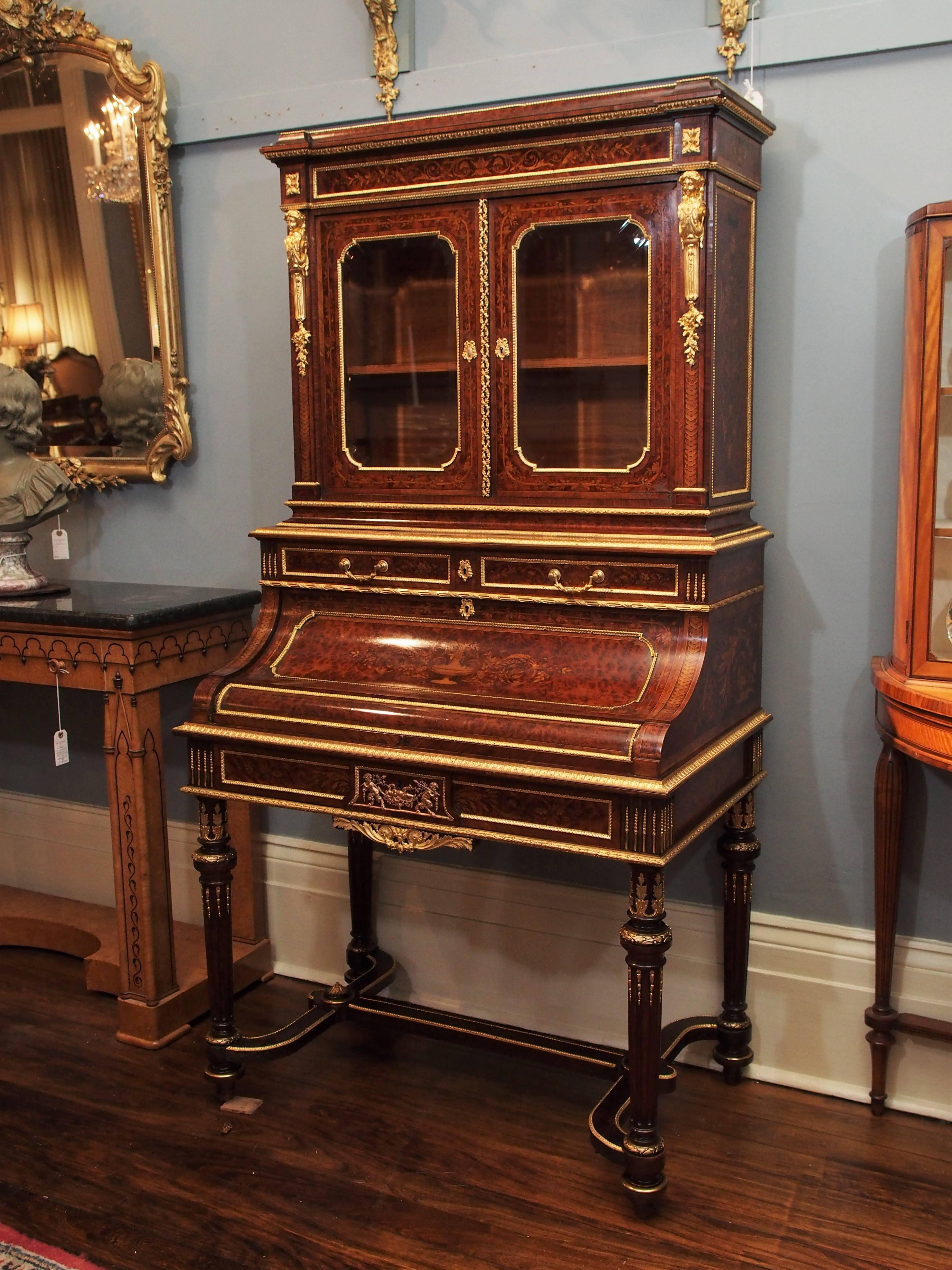 Antique Napoleon III desk and bookcase, circa 1860-1870. This museum quality antique has fine briarwood and wonderful ormolu throughout.