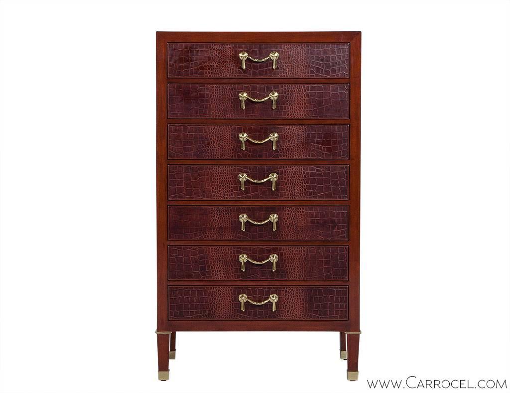 A stunning design from Ralph Lauren’s Brook Street Collection. This highboy has all the storage and functionality you could desire presented in luxuriously appealing style. Holding to the seminary aesthetic, seven croc leather upholstered drawers