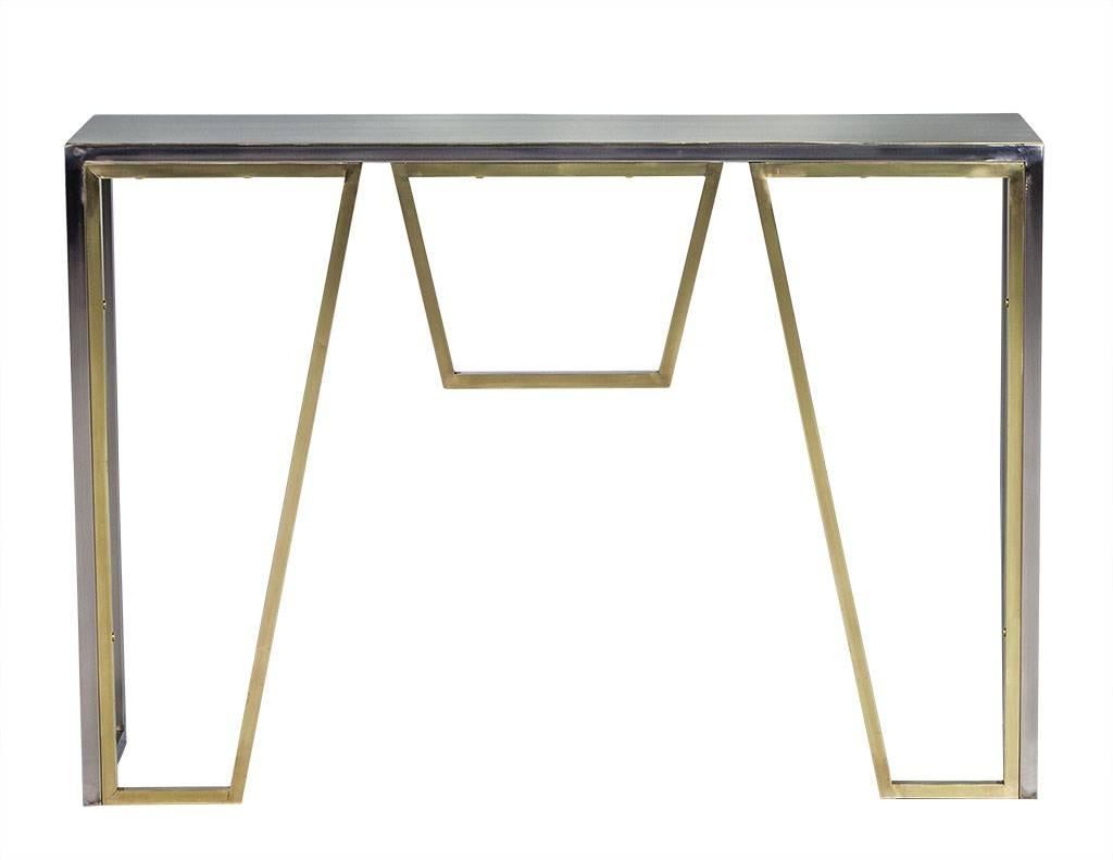 Vintage Italian geometric angular console table constructed from brass and polished nickel in striking square tube framed shapes.