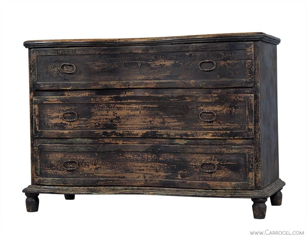 This St. Germain chest with its weathered finish is not only on trend, but authentic. The distressed black finish compliments the simplistic design of this pine chest and the three wide drawers each have two cast iron ring pulls. The perfect
